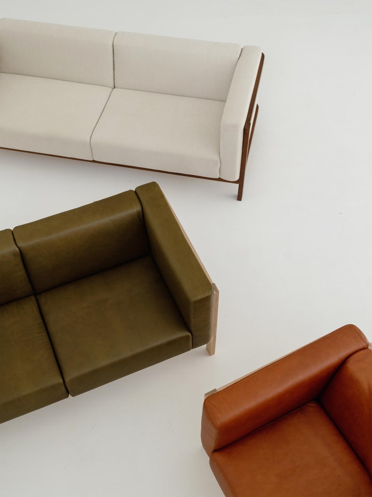https://a.1stdibscdn.com/lift-minimalist-2-seats-sofa-in-solid-oak-wood-and-camel-leather-seat-for-sale-picture-2/f_60192/f_480428721766062445439/LIFT_sofa_37_master.jpg?width=768