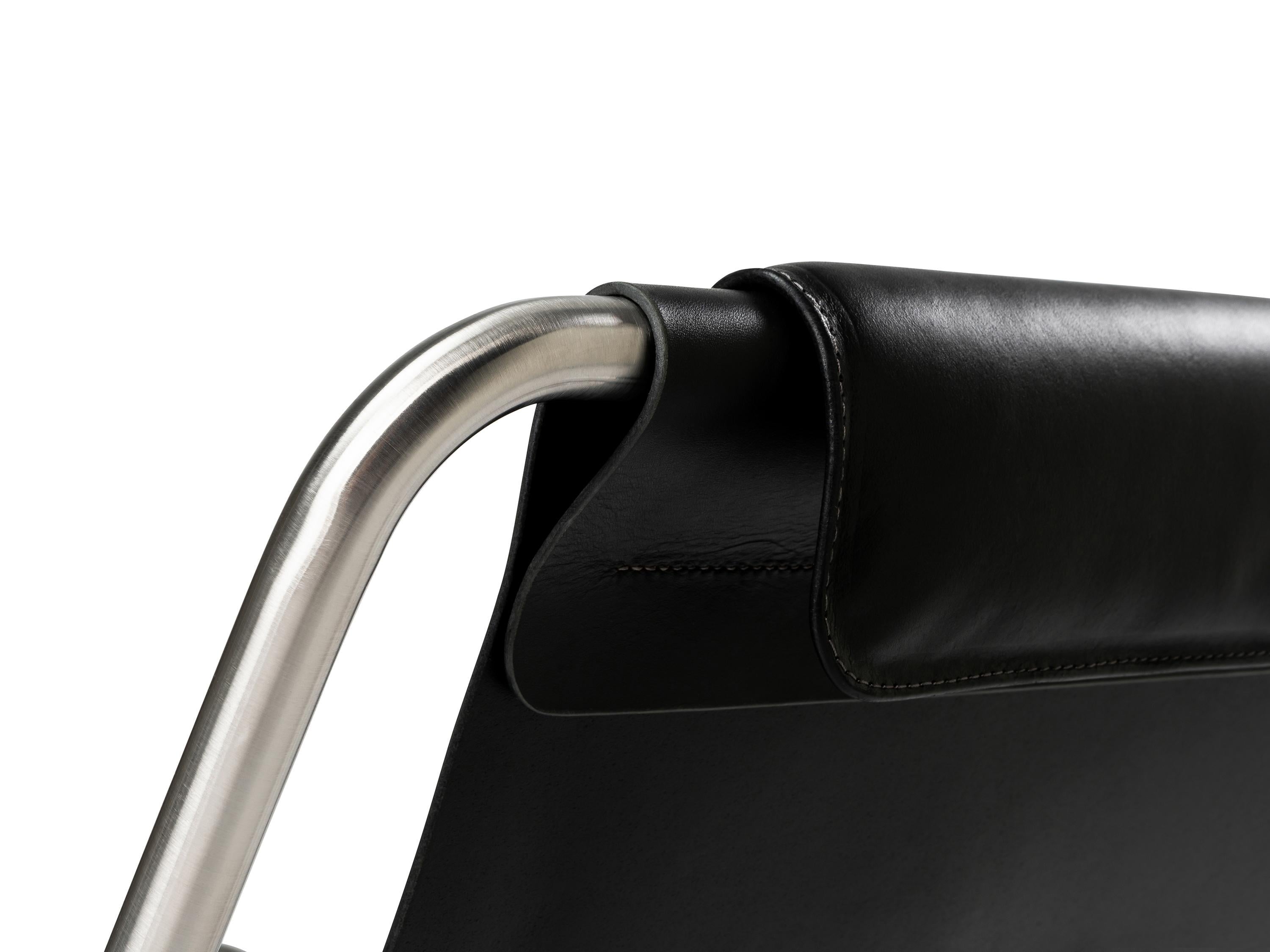 https://a.1stdibscdn.com/minimalist-modern-lounge-chair-in-black-leather-and-brushed-stainless-steel-for-sale-picture-4/f_60192/f_275347621645809504264/LISBOA_lounge_chair_ph_by_Nuno_Sousa_Dias_8_master.jpg