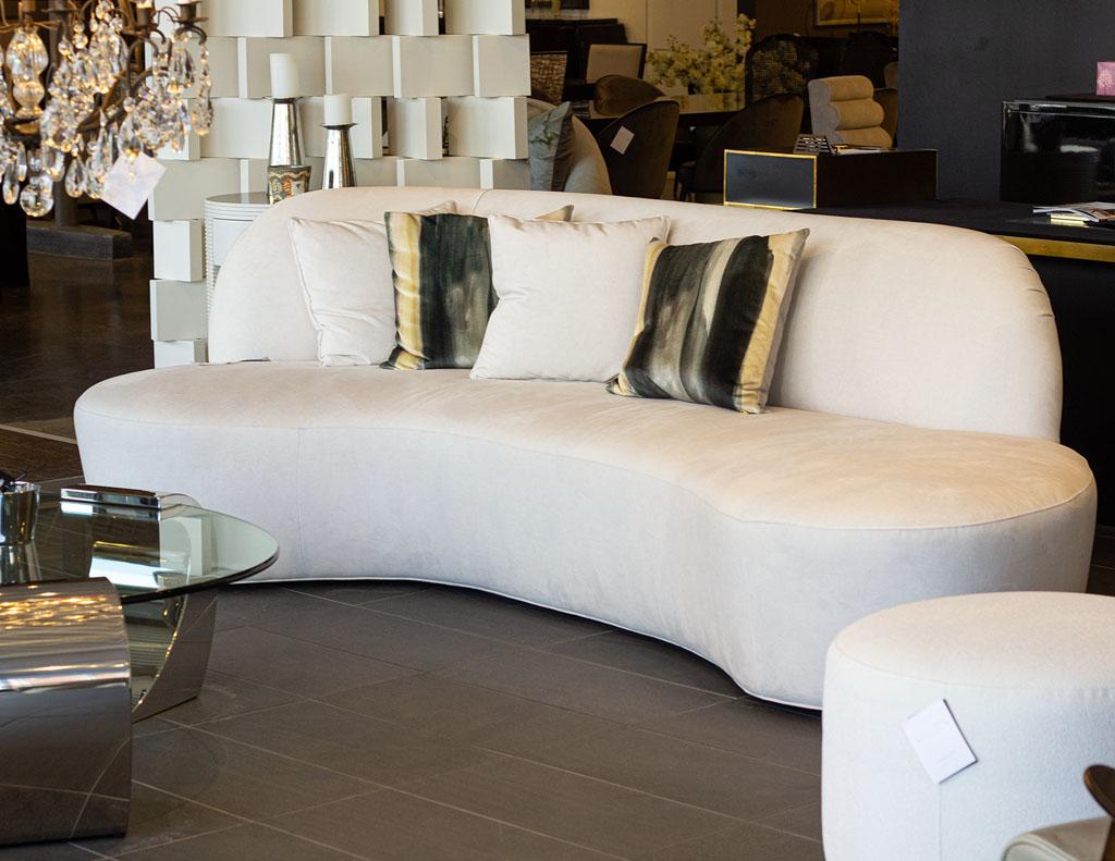 https://a.1stdibscdn.com/custom-mid-century-modern-inspired-curved-sofa-couch-by-carrocel-for-sale-picture-2/f_8849/f_306007121664316237498/LR_3376_Custom_Modern_Sofa_Carrocel_0022_master.jpg
