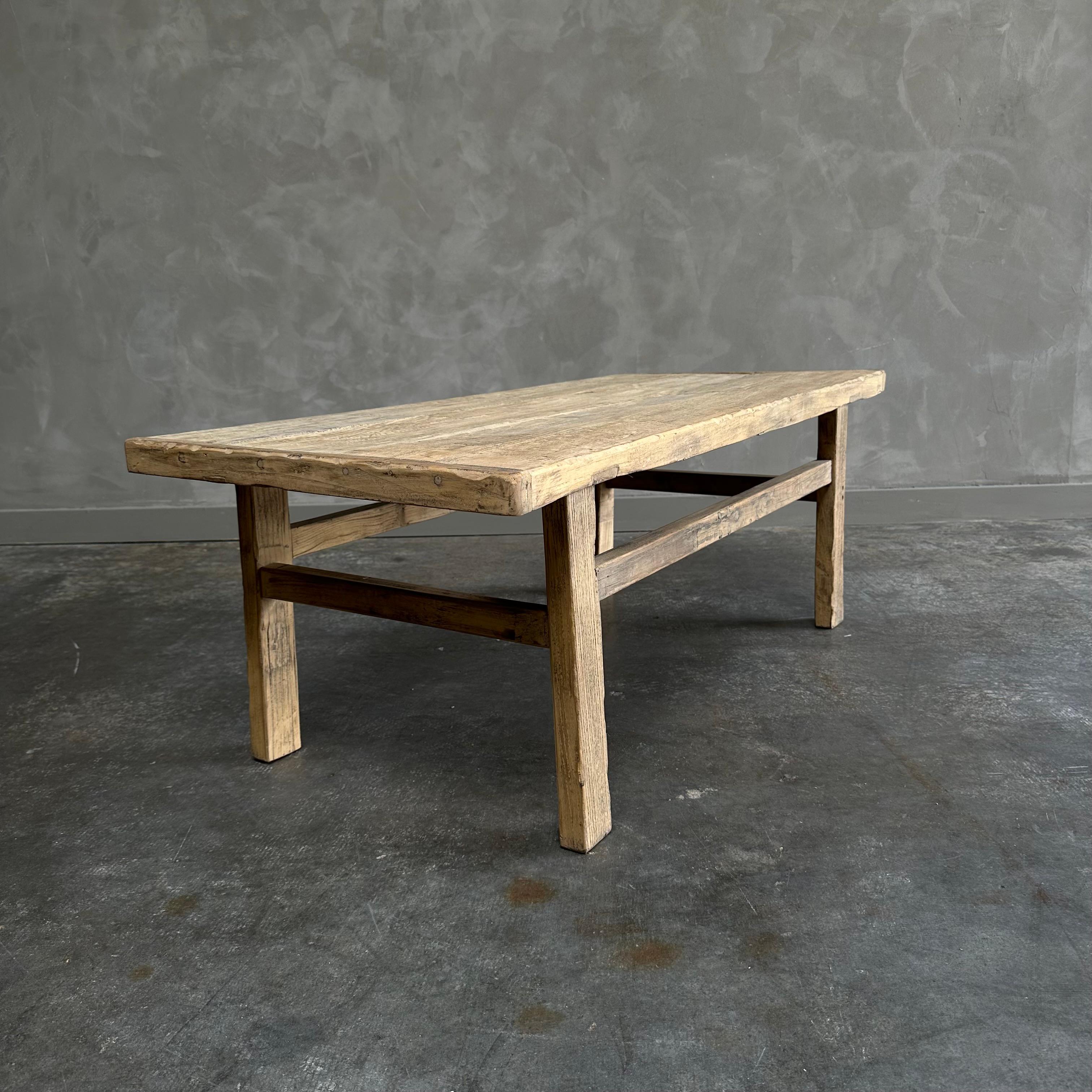 https://a.1stdibscdn.com/custom-made-reclaimed-elm-wood-coffee-table-for-sale-picture-5/f_18223/f_346778321686696457616/L_52_21512_13_master.jpg