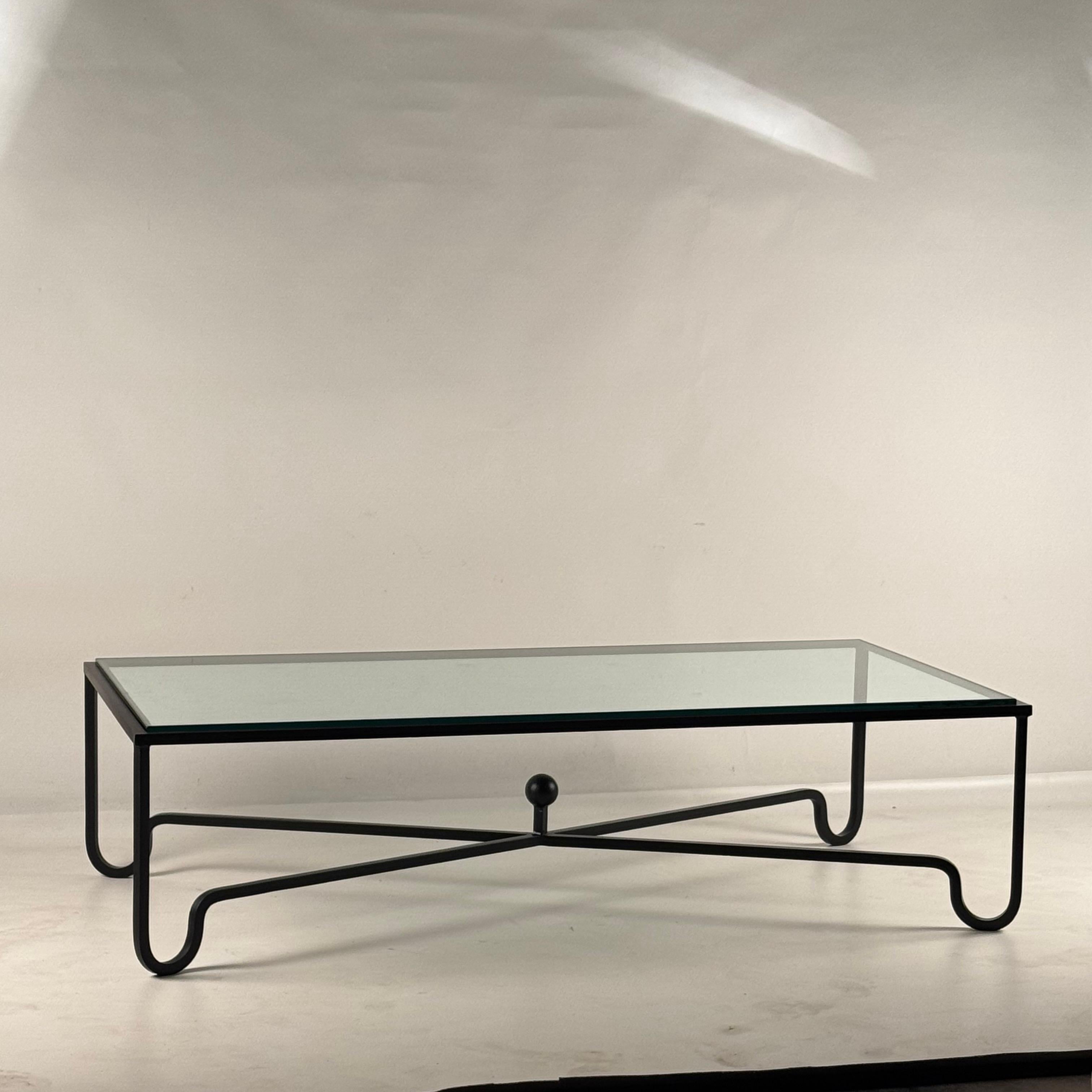 https://a.1stdibscdn.com/large-entretoise-blackened-iron-and-glass-coffee-table-by-design-freres-for-sale-picture-2/f_8184/f_421706021730770410025/Large_Entretoise_Glass_Coffee_Table_1_master.jpg