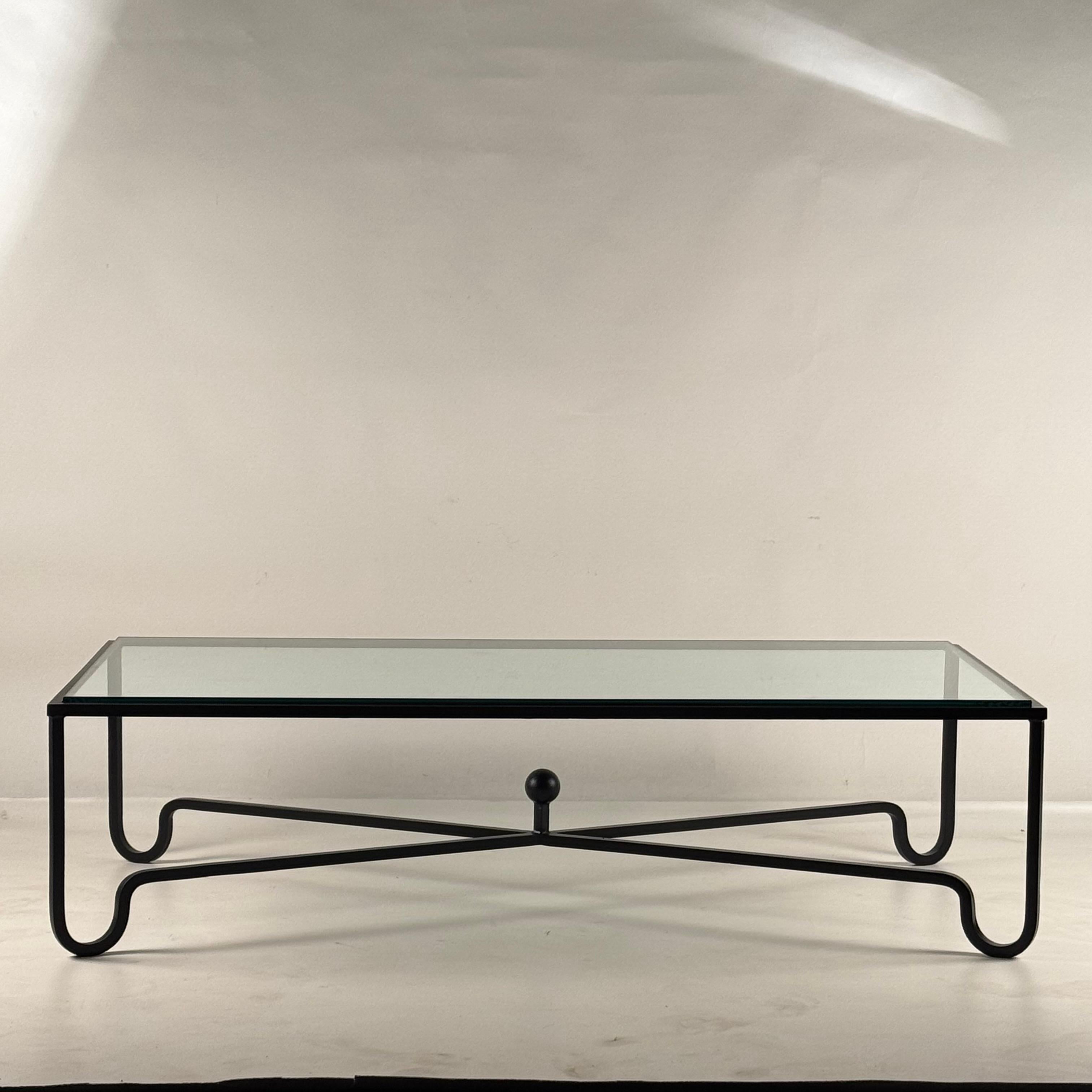 https://a.1stdibscdn.com/large-entretoise-blackened-iron-and-glass-coffee-table-by-design-freres-for-sale-picture-3/f_8184/f_421706021730770413225/Large_Entretoise_Glass_Coffee_Table_2_master.jpg