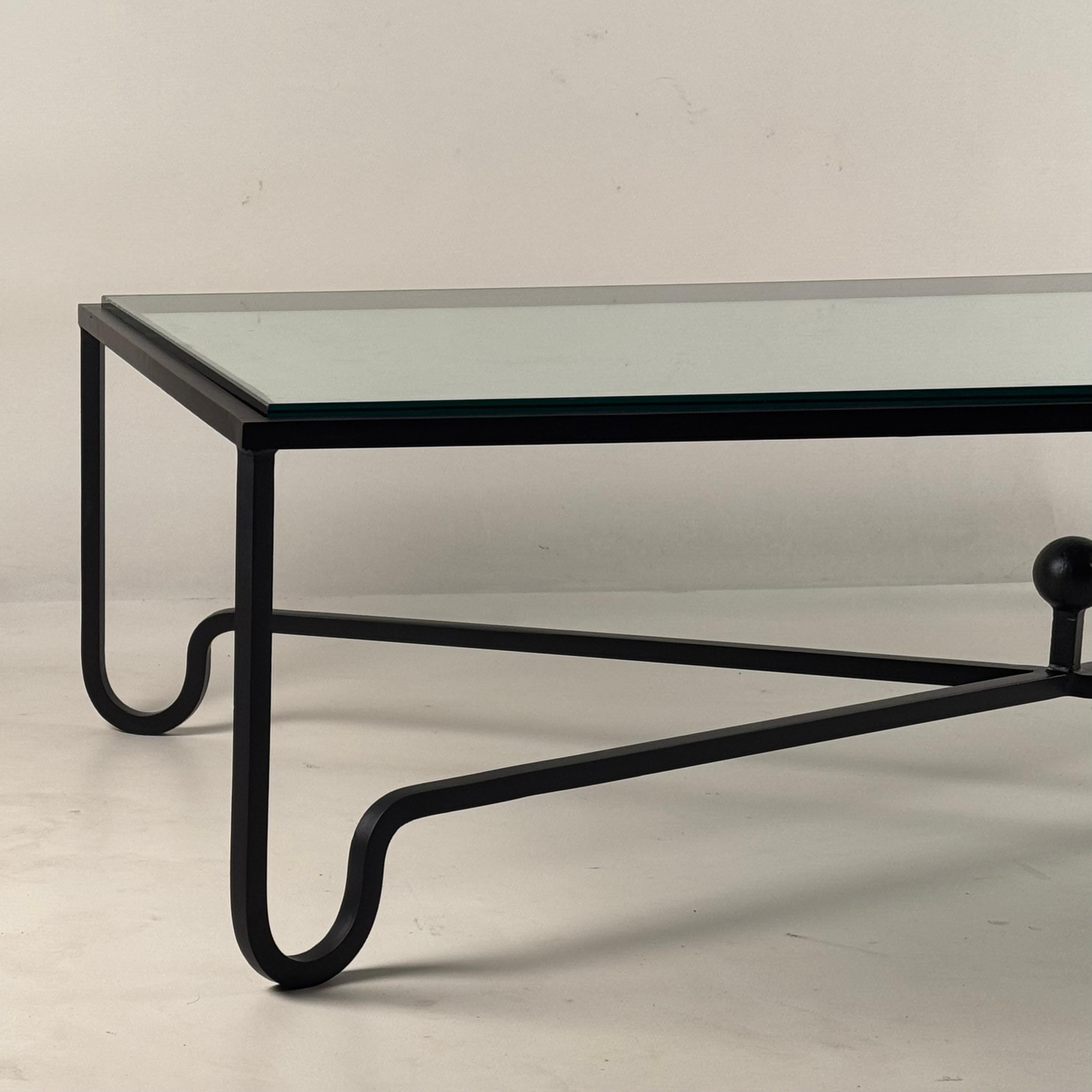 https://a.1stdibscdn.com/large-entretoise-blackened-iron-and-glass-coffee-table-by-design-freres-for-sale-picture-4/f_8184/f_421706021730770409906/Large_Entretoise_Glass_Coffee_Table_3_master.jpg
