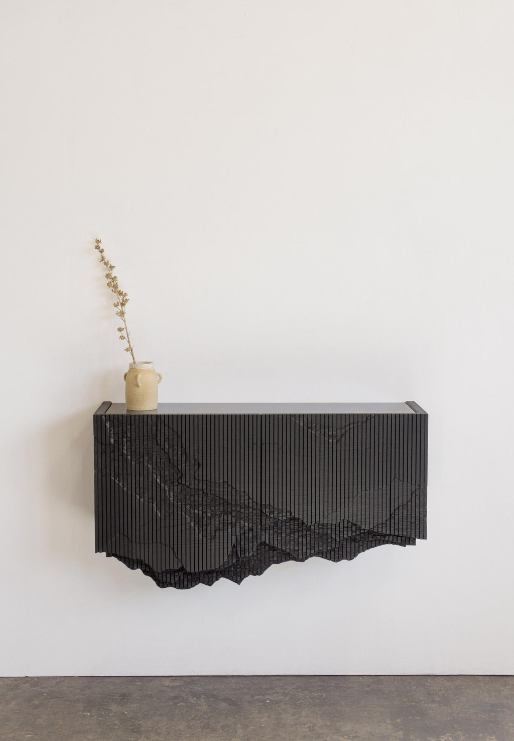 https://a.1stdibscdn.com/ledge-console-in-black-floating-by-simon-johns-for-sale-picture-7/f_26473/1554301596890/Ledge_w_potWEB_master.jpg