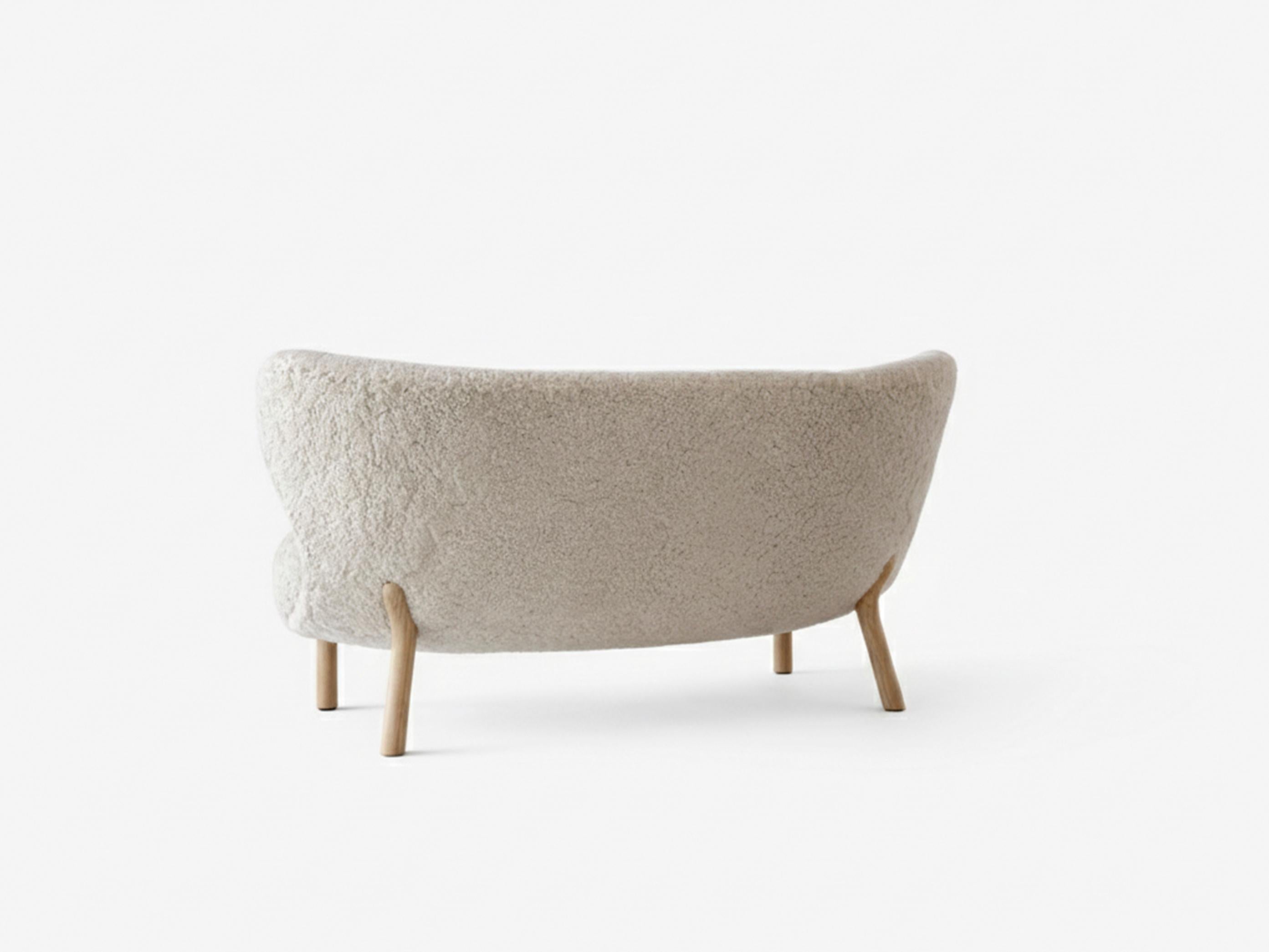 https://a.1stdibscdn.com/little-petra-sofa-by-viggo-boesen-in-sheepskin-moonlight-oiled-oak-for-t-for-sale-picture-4/f_51432/f_487443021770730882316/Little_Petra_VB2_in_Oiled_Oak_w_Sheepskin_Moonlight_back_master.jpg