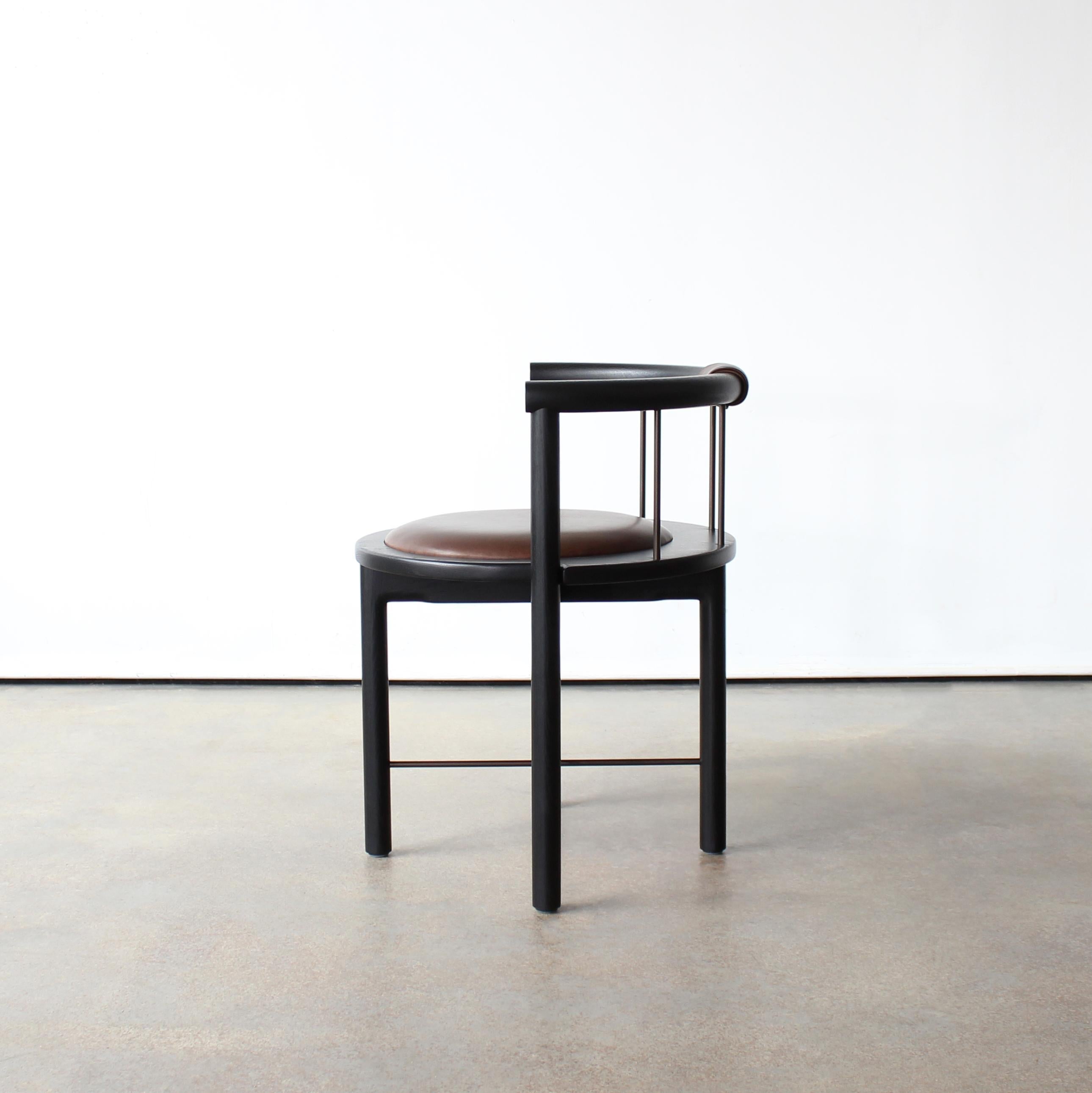 https://a.1stdibscdn.com/lloyd-vanity-and-desk-low-back-arm-chair-by-crump-and-kwash-for-sale-picture-6/f_25303/f_319010021671807842096/LloydChairBlackChocolate2_master.jpg