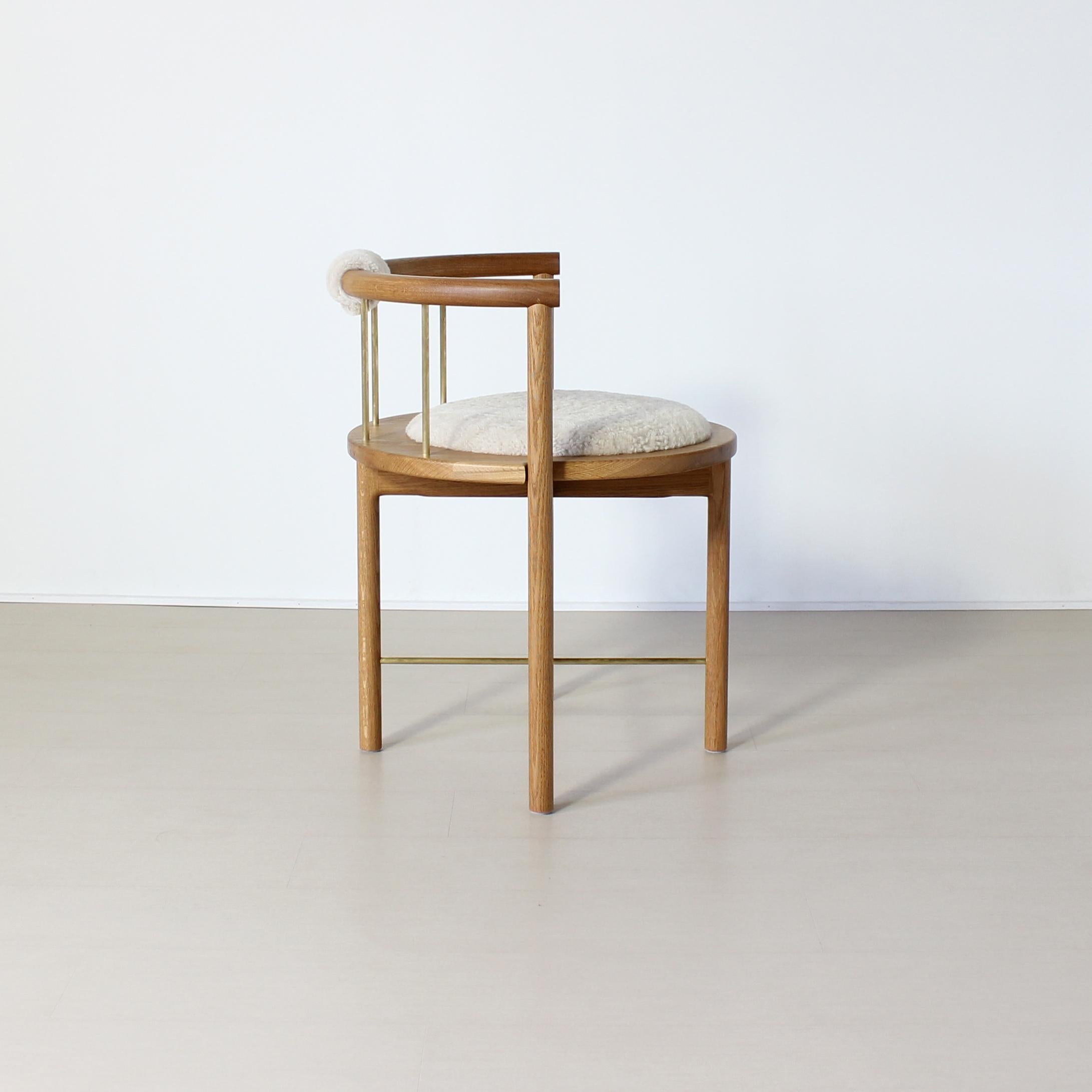 https://a.1stdibscdn.com/limited-edition-modern-lloyd-accent-chair-in-white-oak-brass-shearling-for-sale-picture-5/f_25303/f_138575211551459556349/LloydSheerOakBrass4_master.jpg