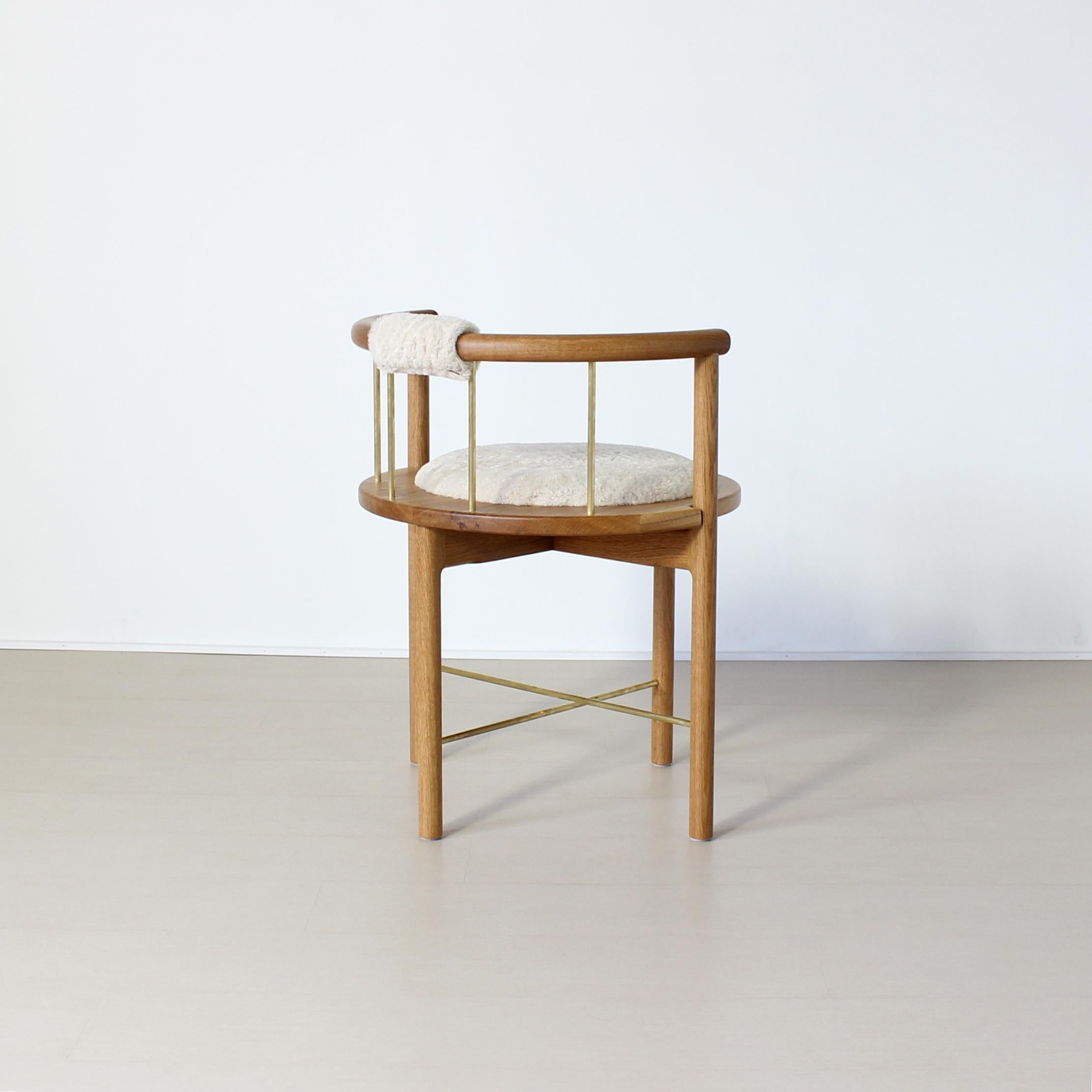 https://a.1stdibscdn.com/limited-edition-modern-lloyd-accent-chair-in-white-oak-brass-shearling-for-sale-picture-6/f_25303/f_138575211551459556802/LloydSheerOakBrass5_master.jpg