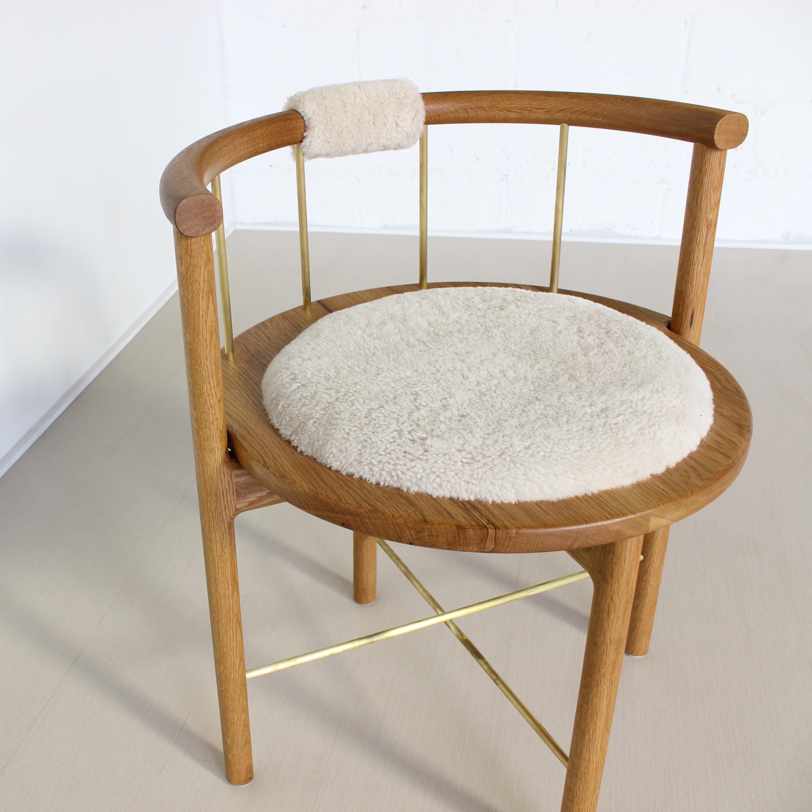 https://a.1stdibscdn.com/limited-edition-modern-lloyd-accent-chair-in-white-oak-brass-shearling-for-sale-picture-7/f_25303/f_138575211551459557221/LloydSheerOakBrass8_master.jpg