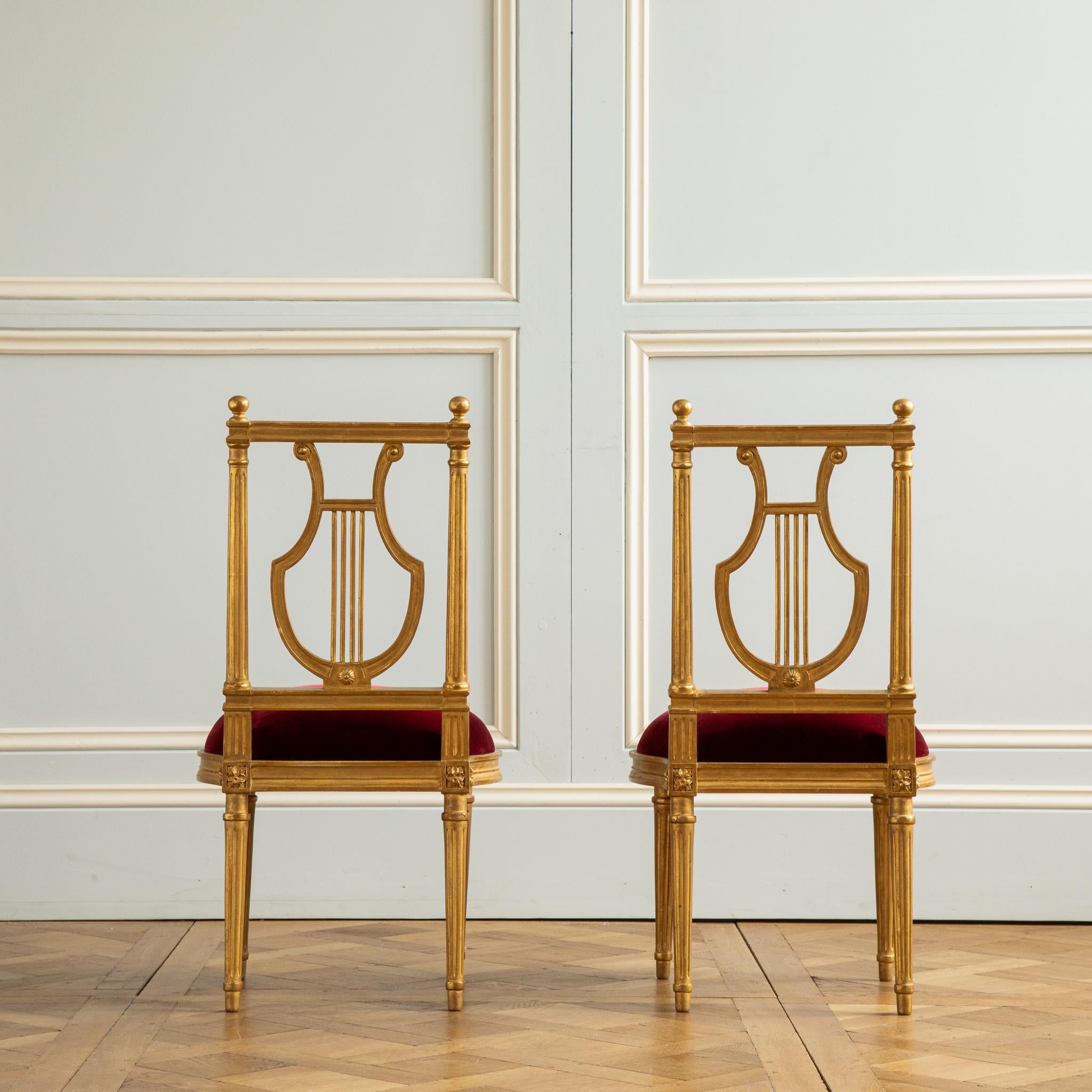 https://a.1stdibscdn.com/louis-xvi-gilded-lyre-chairs-with-deep-red-velvet-inspired-by-jacob-for-sale-picture-6/f_23353/f_299536821660301307306/Louis_XVI_gilded_Lyre_Chairs_Red_velvet_560_master.jpg