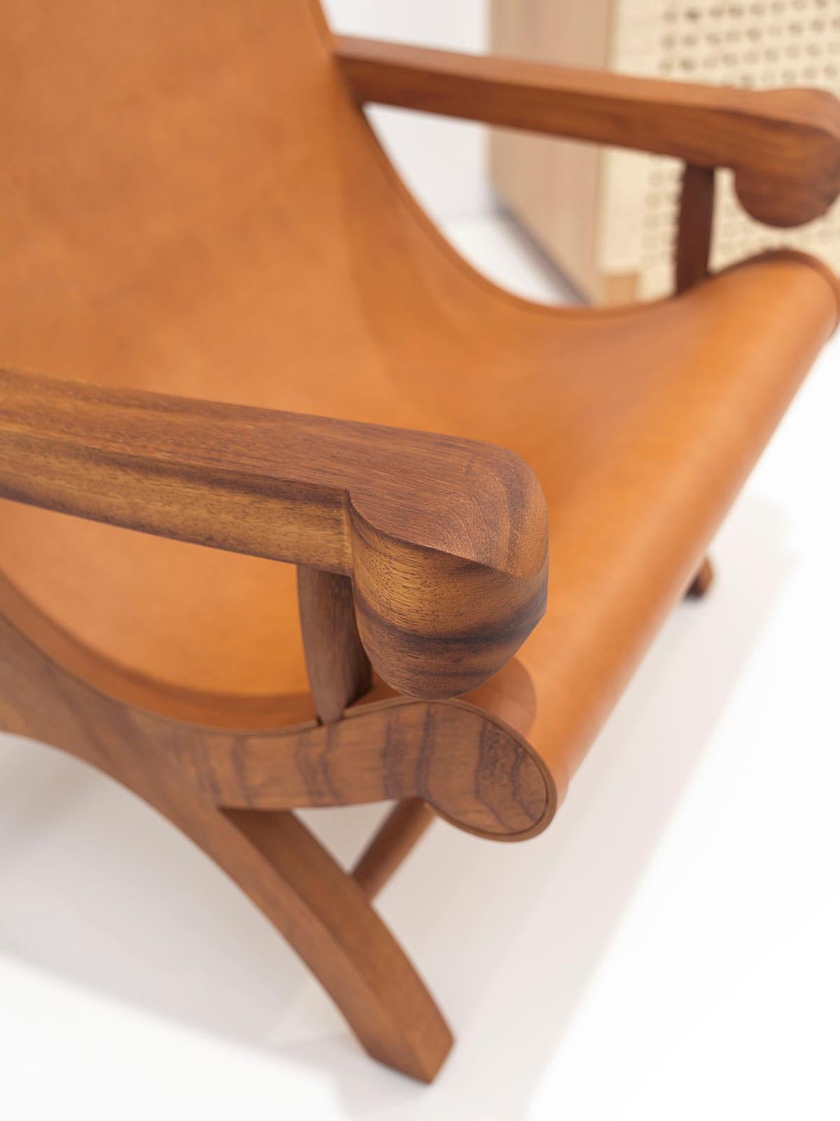 https://a.1stdibscdn.com/butaque-armchair-licensed-reedition-tropical-hardwood-tan-leather-in-stock-for-sale-picture-8/f_34063/f_483881321768836435966/Luteca_Butaque_Armchair_IK_NA_LH001_L1_master.jpg