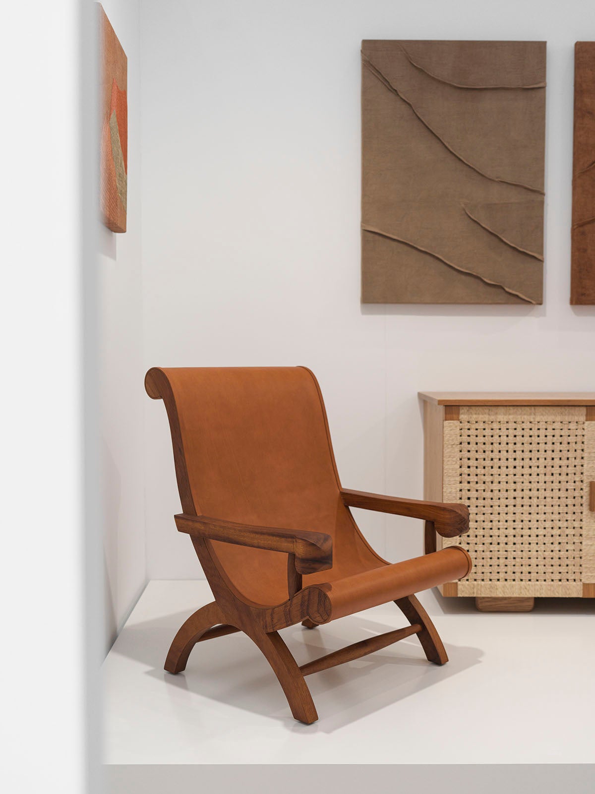 https://a.1stdibscdn.com/butaque-armchair-licensed-reedition-tropical-hardwood-tan-leather-in-stock-for-sale-picture-2/f_34063/f_483881321768836396534/Luteca_Butaque_Armchair_IK_NA_LH001_L2_org.jpg