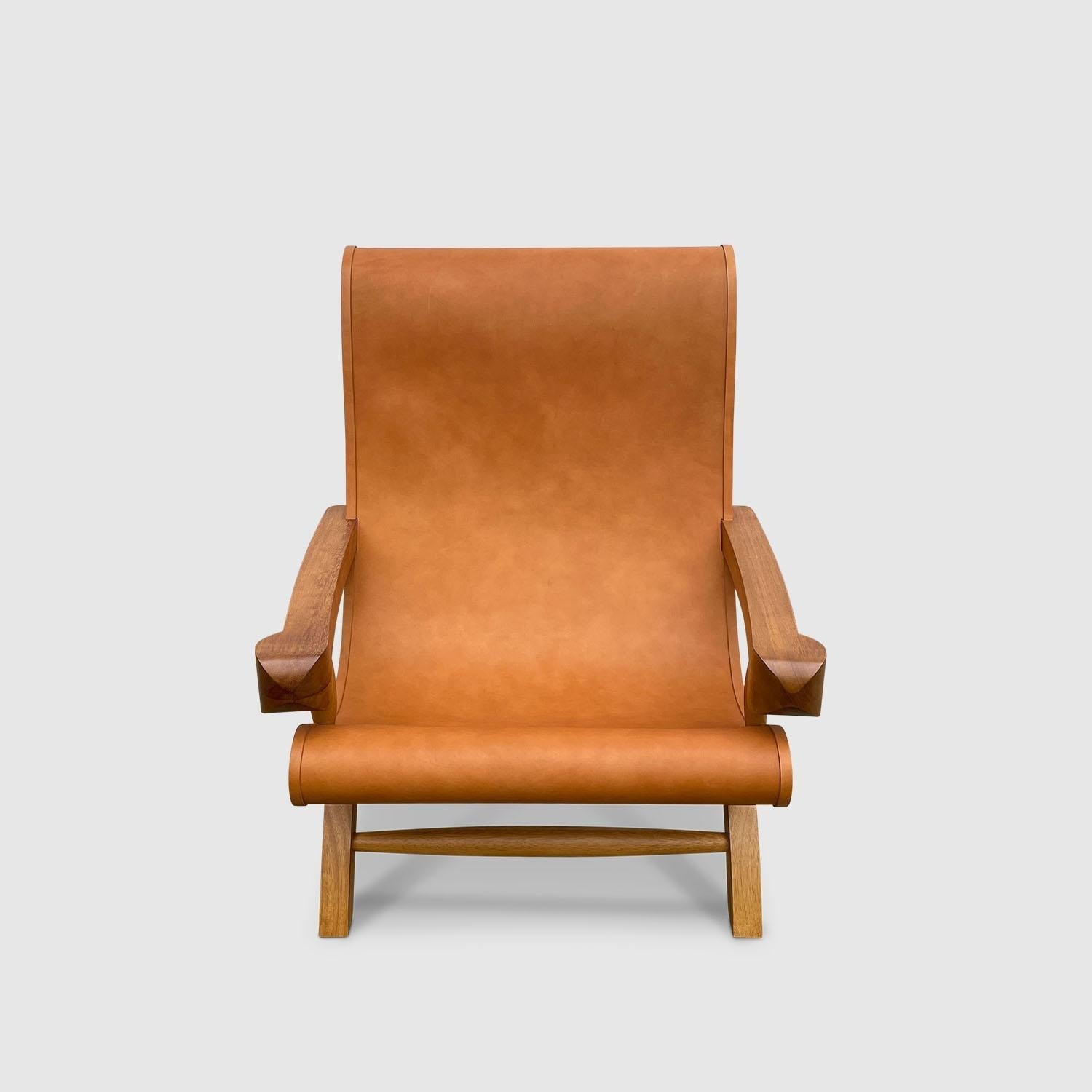 https://a.1stdibscdn.com/butaque-armchair-licensed-reedition-tropical-hardwood-tan-leather-in-stock-for-sale-picture-4/f_34063/f_483881321768836422022/Luteca_Butaque_Armchair_Teak_Tan_Hide_W3_master.jpg