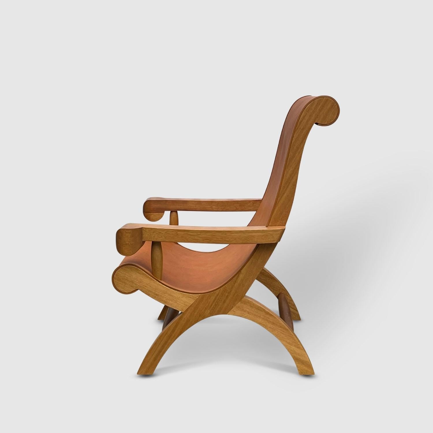 https://a.1stdibscdn.com/butaque-armchair-licensed-reedition-tropical-hardwood-tan-leather-in-stock-for-sale-picture-5/f_34063/f_483881321768836422170/Luteca_Butaque_Armchair_Teak_Tan_Hide_W4_master.jpg