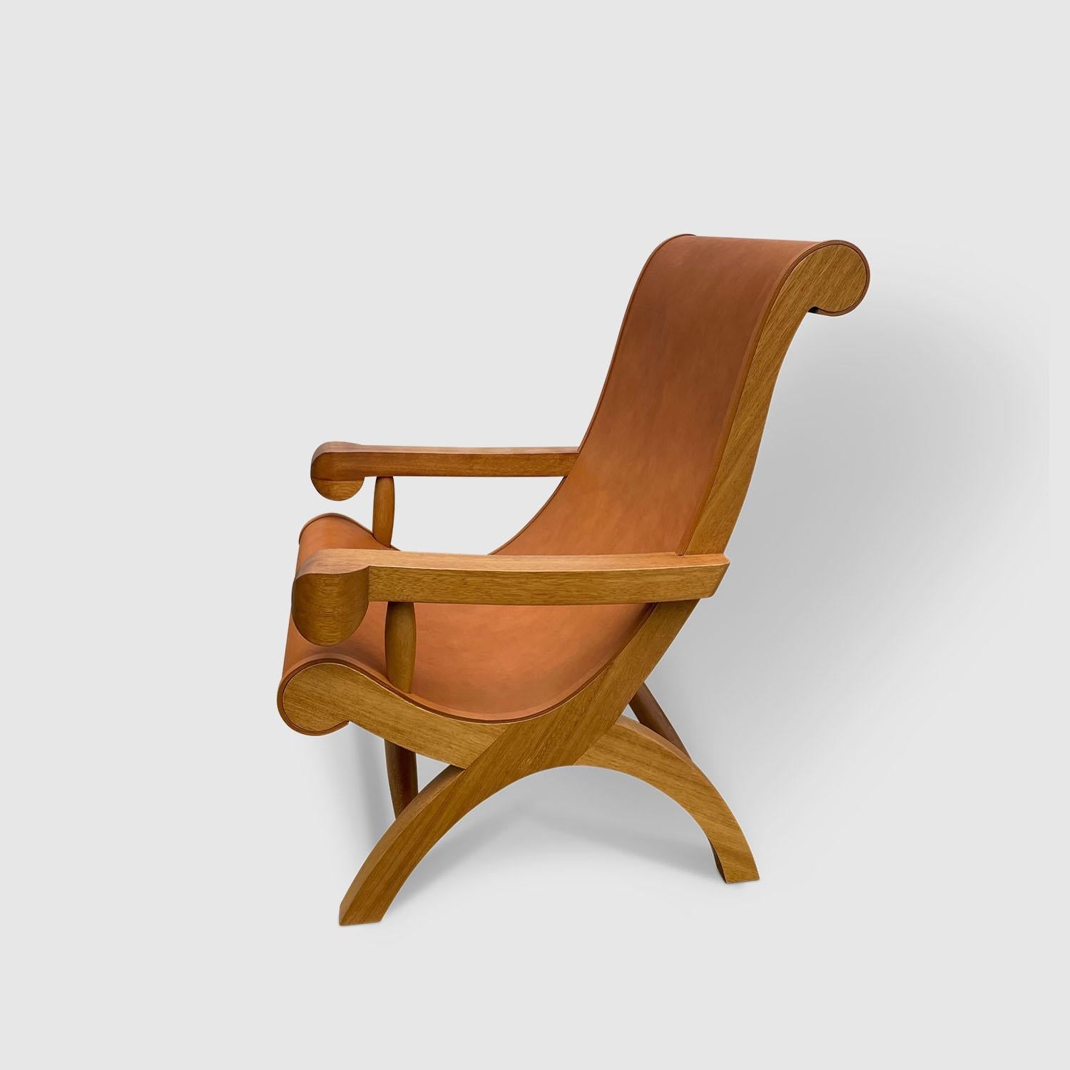 https://a.1stdibscdn.com/butaque-armchair-licensed-reedition-tropical-hardwood-tan-leather-in-stock-for-sale-picture-6/f_34063/f_483881321768836422176/Luteca_Butaque_Armchair_Teak_Tan_Hide_W5_master.jpg
