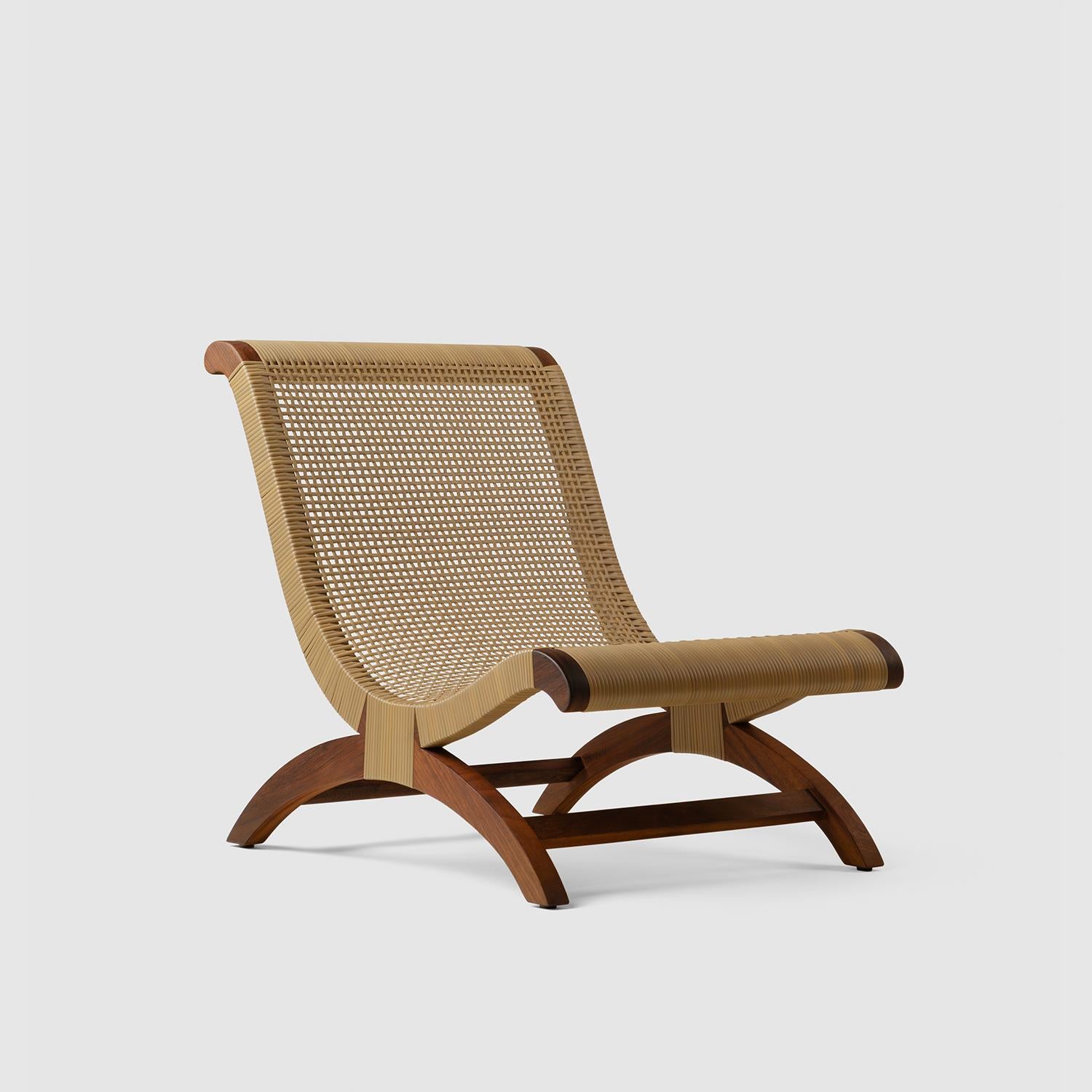 https://a.1stdibscdn.com/tropical-hardwood-and-rattan-butaque-chair-outdoor-use-licensed-reedition-for-sale-picture-4/f_34063/f_243655221768837852364/Luteca_Butaque_Clasica_Woven_W2_master.jpg