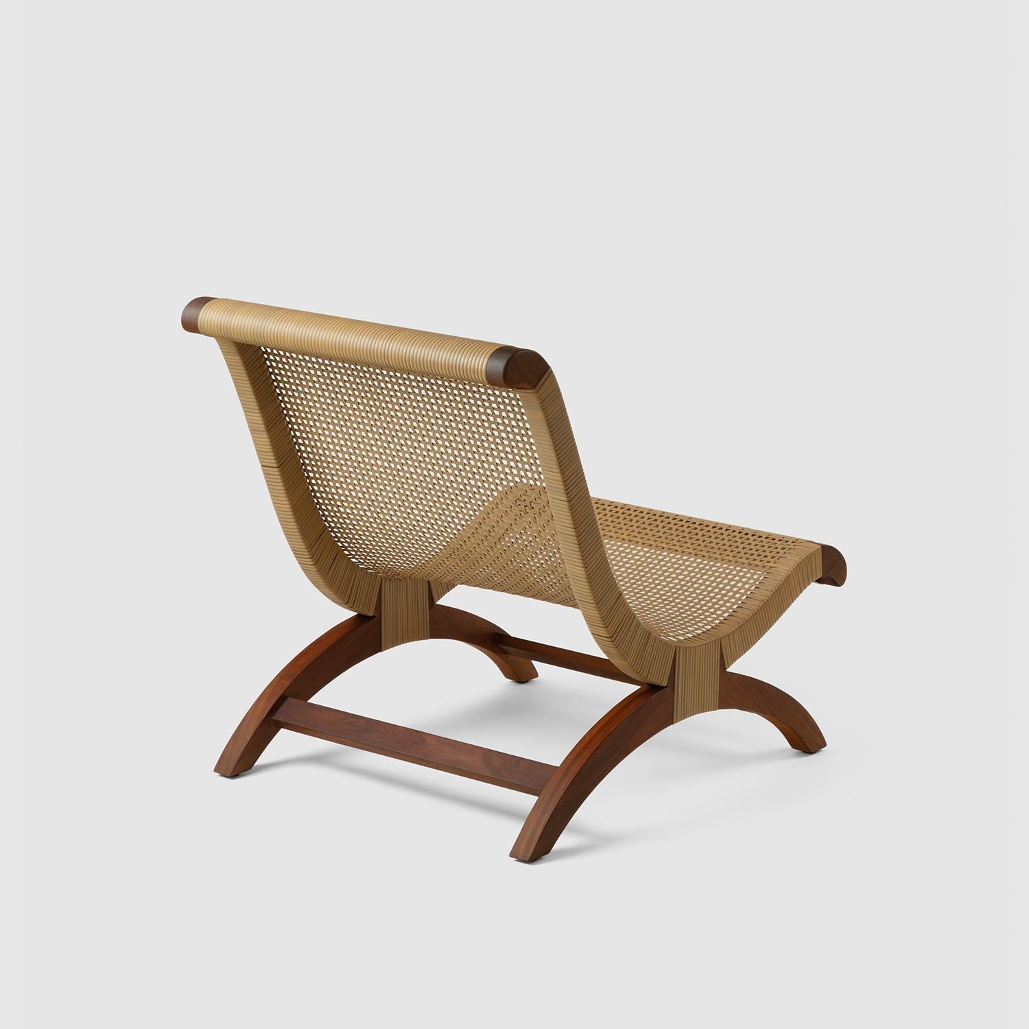 https://a.1stdibscdn.com/tropical-hardwood-and-rattan-butaque-chair-outdoor-use-licensed-reedition-for-sale-picture-5/f_34063/f_243655221768837852451/Luteca_Butaque_Clasica_Woven_W3_master.jpg