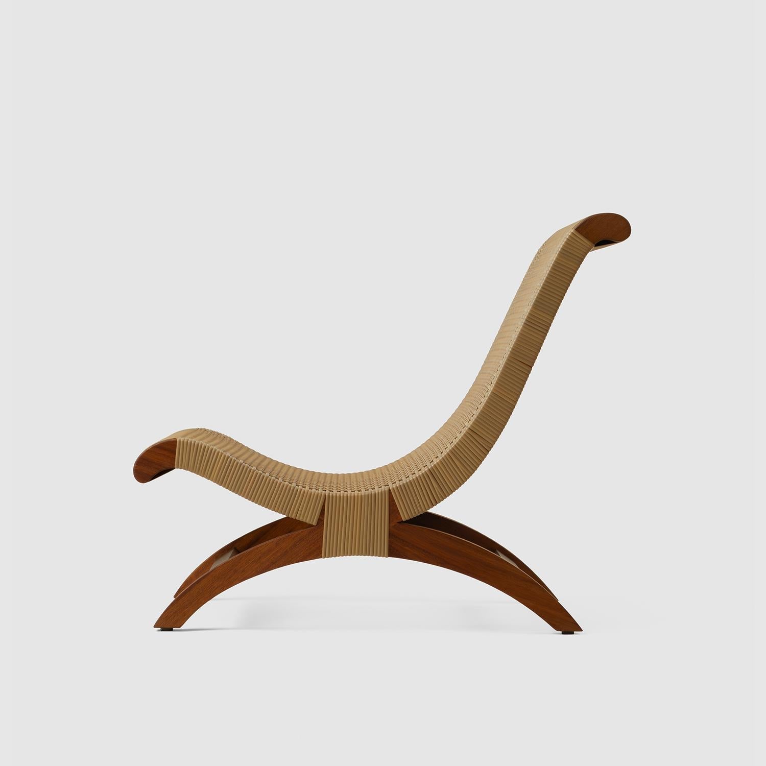 https://a.1stdibscdn.com/tropical-hardwood-and-rattan-butaque-chair-outdoor-use-licensed-reedition-for-sale-picture-8/f_34063/f_243655221768837852421/Luteca_Butaque_Clasica_Woven_W6_master.jpg