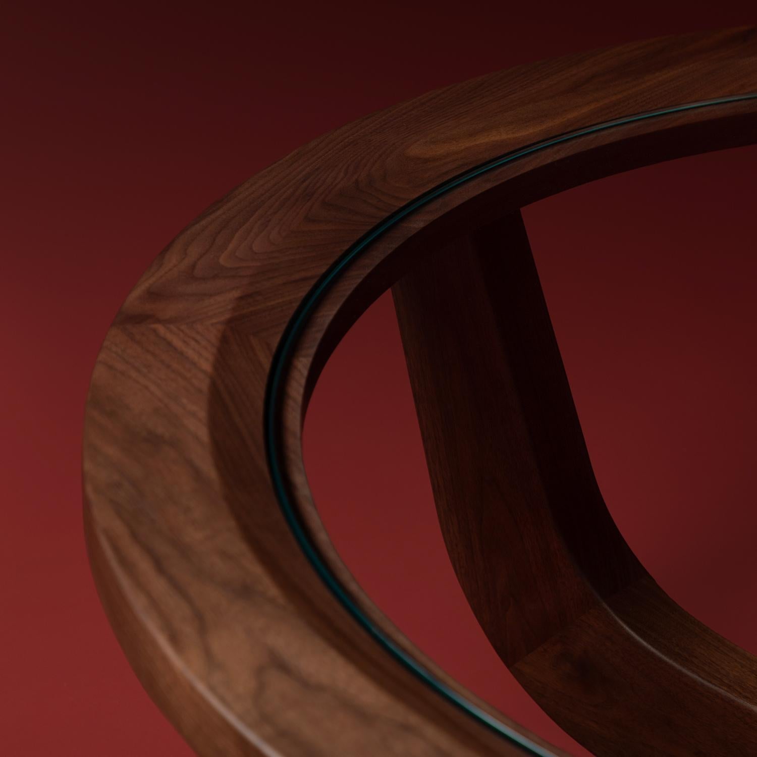 https://a.1stdibscdn.com/clara-porset-modernist-cp3-solid-walnut-and-glass-coffee-table-by-luteca-for-sale-picture-10/f_34063/f_135740321766177330589/Luteca_CP3_Coffee_Table_Walnut_Glass_D2_master.jpg
