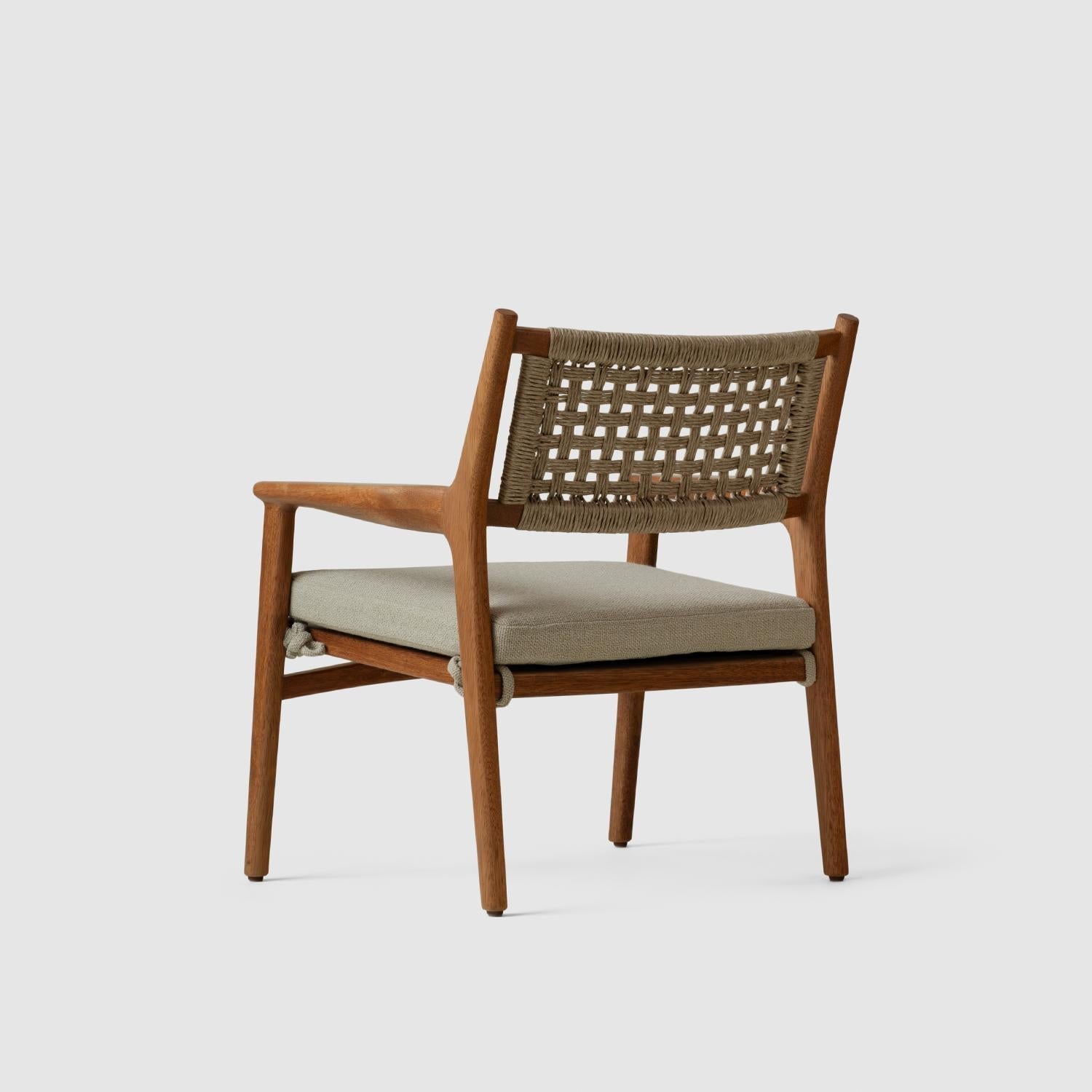 https://a.1stdibscdn.com/solid-tropical-wood-armchair-for-indoor-outdoor-woven-cord-backrest-and-cushion-for-sale-picture-3/f_34063/f_483878321768834570147/Luteca_Lina_Armchair_TNS_Comporta_W2_master.jpg