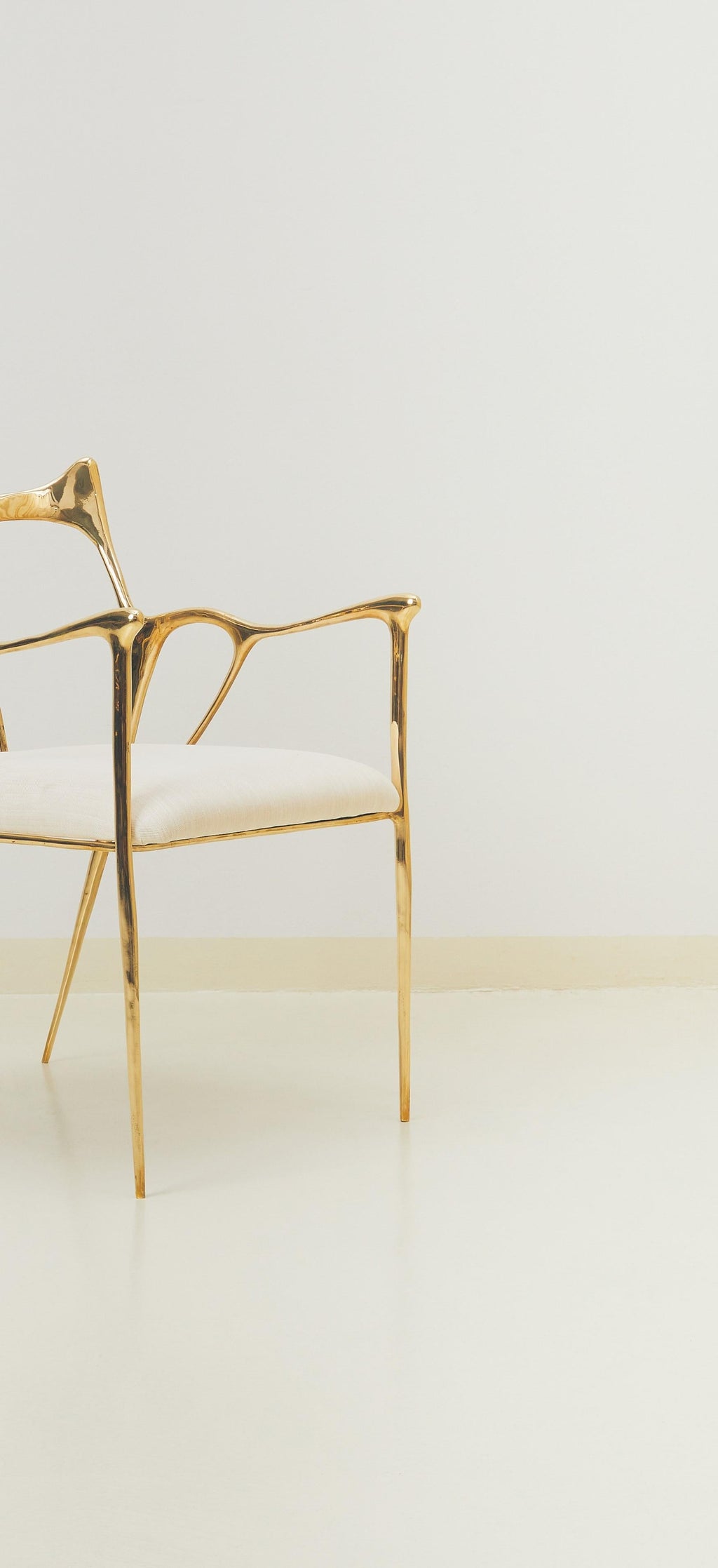 https://a.1stdibscdn.com/calligraphic-sculpted-brass-chair-by-misaya-for-sale-picture-4/f_12192/f_412042821724637709732/M0177_1_master.jpg