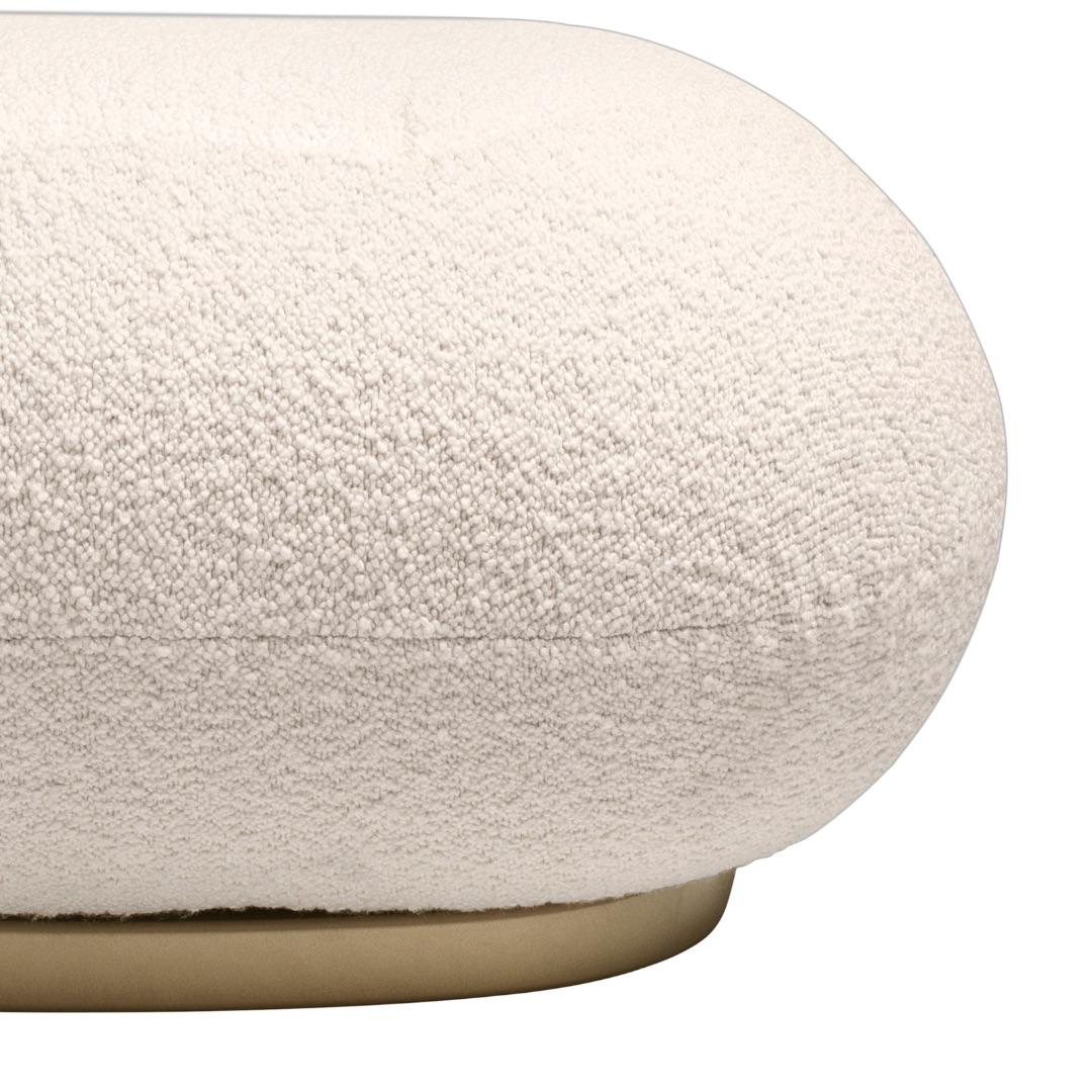 https://a.1stdibscdn.com/pierre-paulin-pacha-upholstered-ottoman-with-black-base-for-gubi-for-sale-picture-12/f_14472/f_460519221753720829298/M3580_Pacha_Ottoman_pacha_ottoman_detail_karakorum_gold_base_master.jpeg