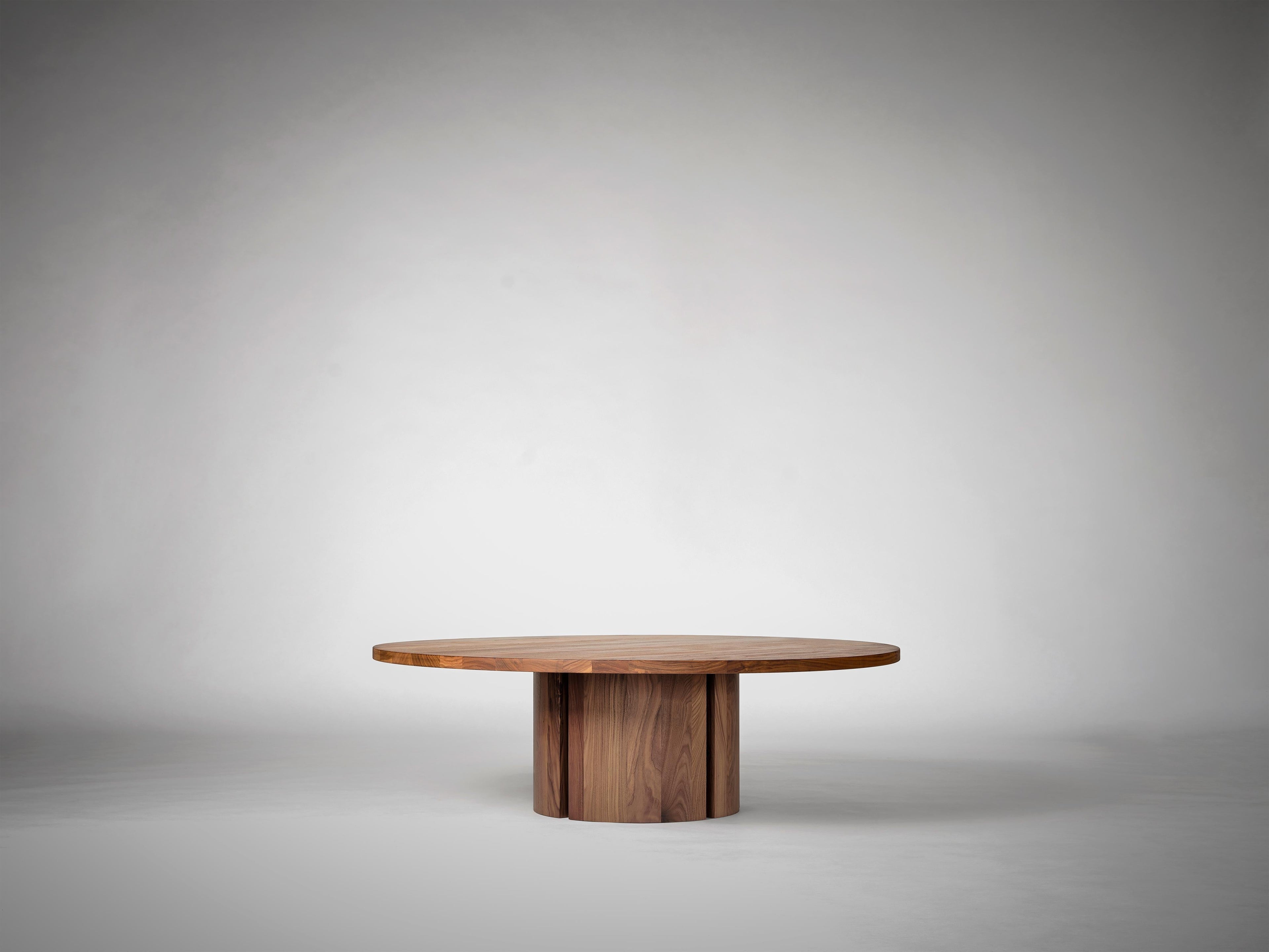 https://a.1stdibscdn.com/large-round-coffee-table-in-solid-dark-brown-european-oak-aperta-by-mokko-for-sale-picture-7/f_89302/f_478045021764684922140/MAIN_Mokko_Aperta_Round_Coffee_Table_American_Walnut_G3_photo_by_Thomas_van_Schaik_master.jpg