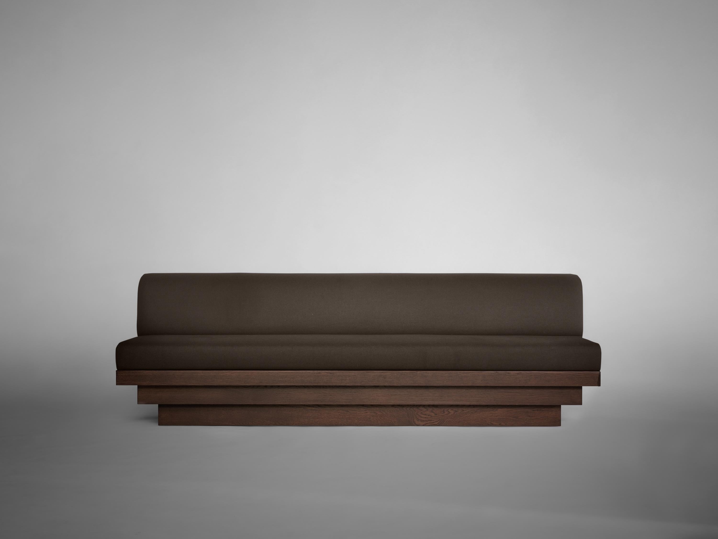 https://a.1stdibscdn.com/dining-sofa-sculptural-design-custom-european-oak-pure-wool-scalae-by-mokko-for-sale-picture-3/f_89302/f_492909821773926569288/MAIN_Mokko_Scalae_Dining_and_Lounge_Sofa_Warm_Brown_Oak_Green_Wool_light_gray_front_view_photo_by_Thomas_van_Schaik_master.jpg