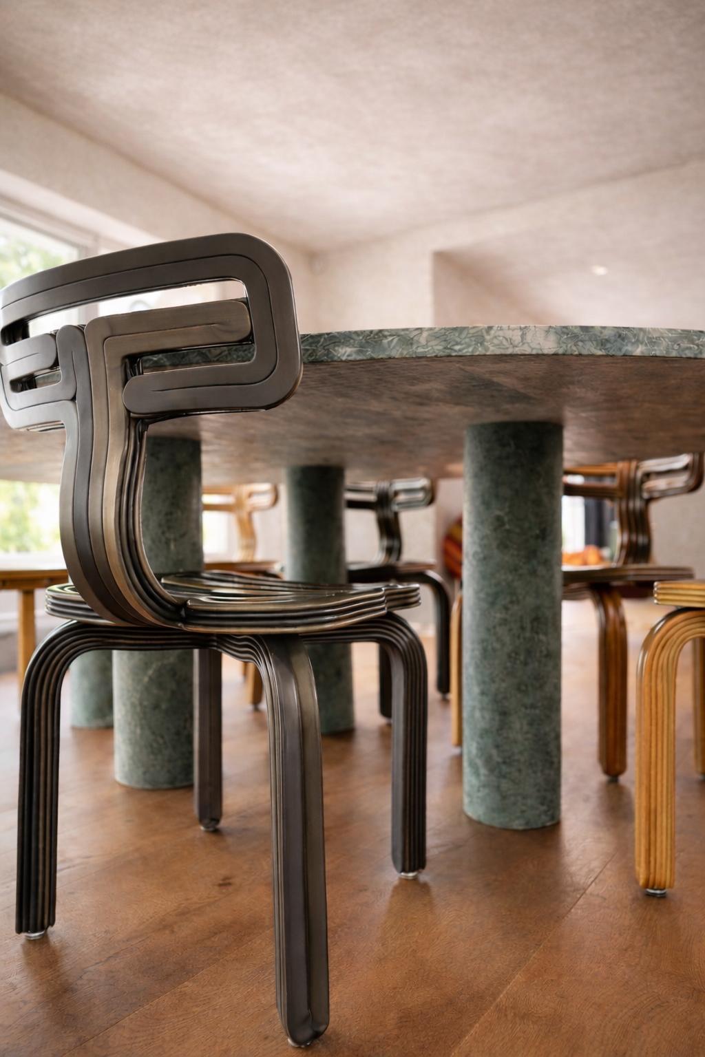 https://a.1stdibscdn.com/large-solid-stone-green-marble-oval-dining-table-with-bellini-style-column-legs-for-sale-picture-3/f_80522/f_475397421767616173186/MARIO_OVAL_GREEN_MARBLE_XL__master.jpg