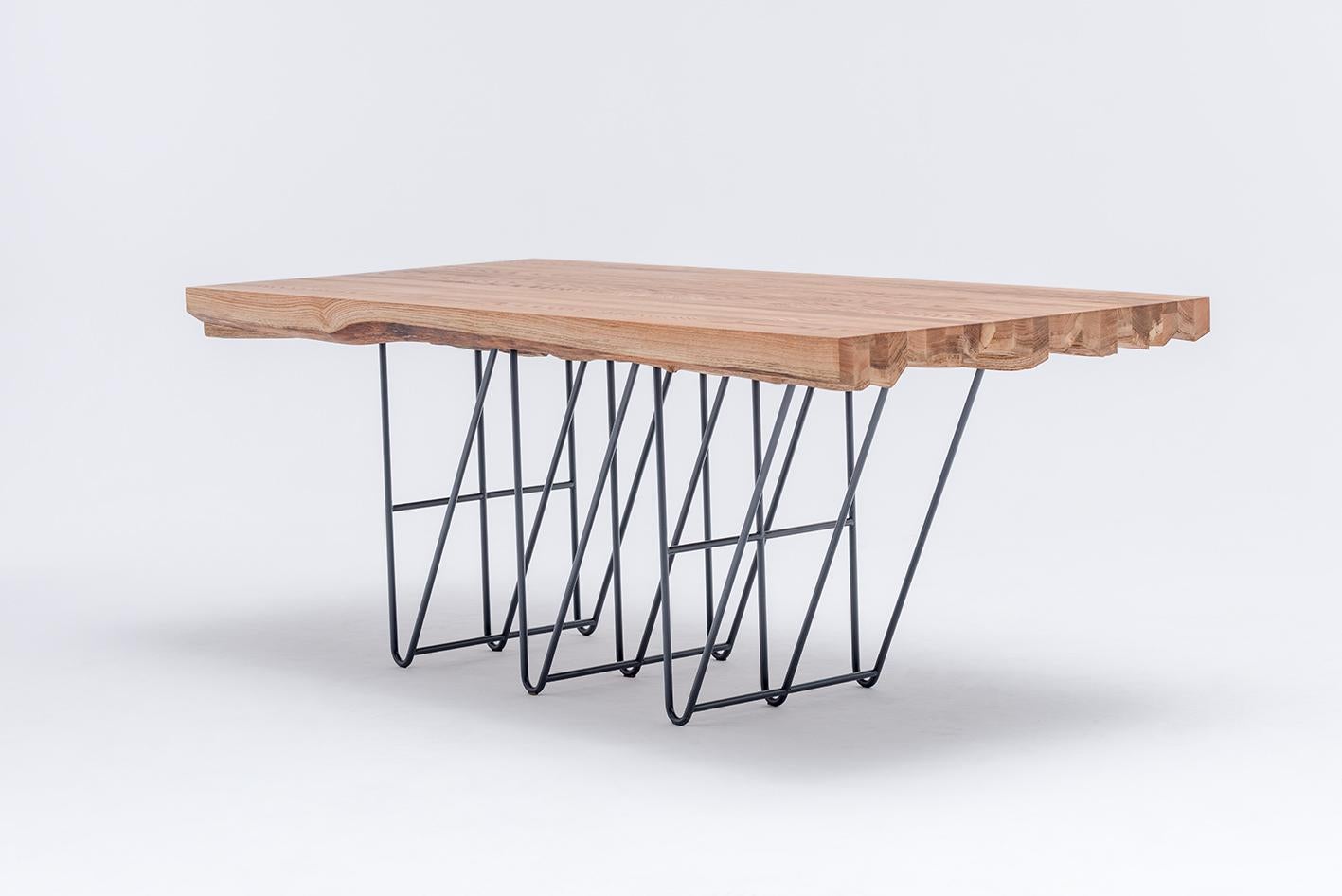 https://a.1stdibscdn.com/modern-sculptural-solid-oak-dining-table-masiv-european-craftsmanship-for-sale-picture-3/f_105832/f_463980021756038213269/MASIV_TABLE_SWALLOWS_TAIL_FURNITURE_2_master.jpg