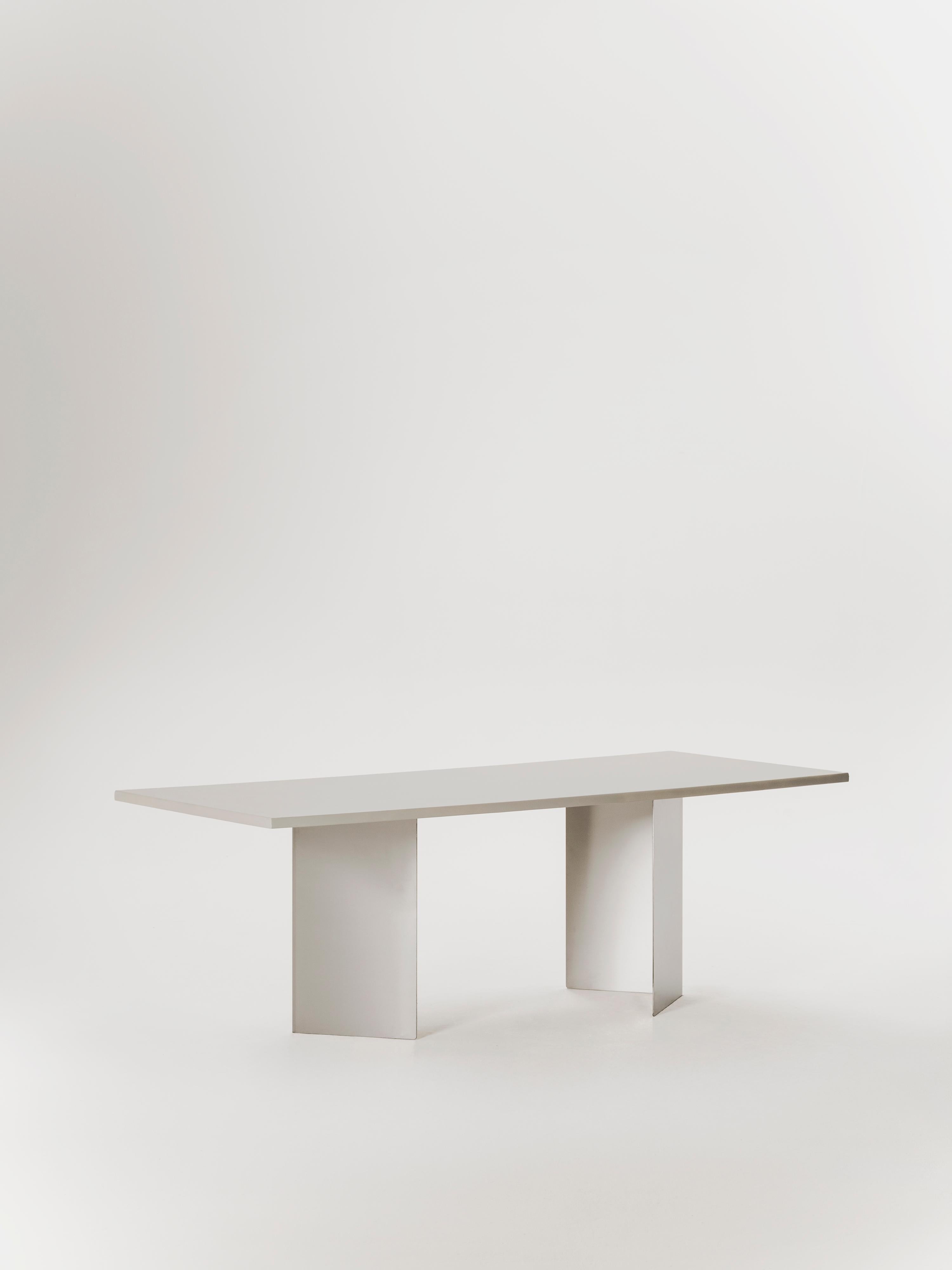 https://a.1stdibscdn.com/allma-microcement-stainless-steel-dining-table-by-marlot-baus-for-sale-picture-3/f_106442/f_471821721761302203953/MB_3403_master.jpg