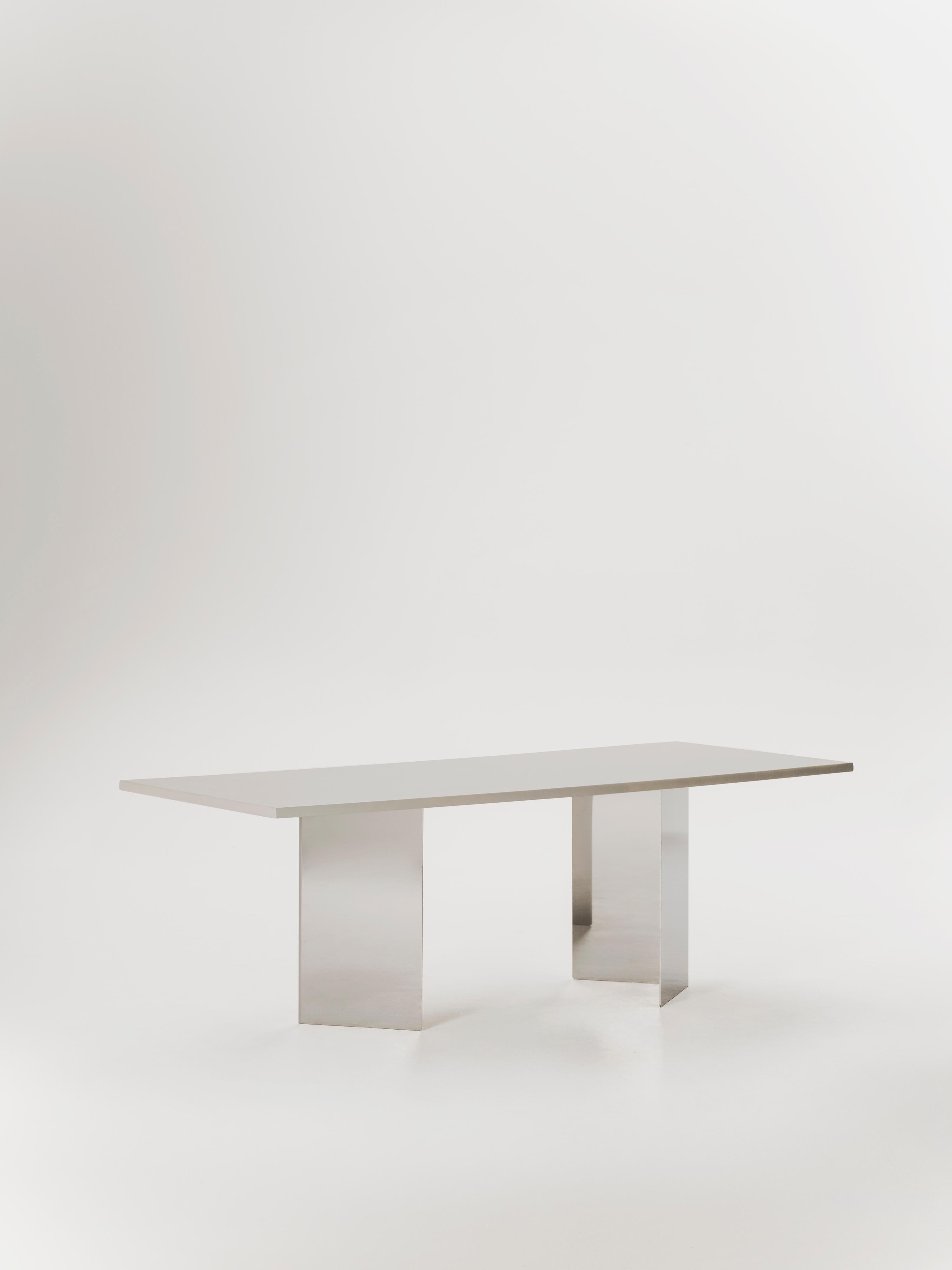 https://a.1stdibscdn.com/allma-microcement-stainless-steel-dining-table-by-marlot-baus-for-sale-picture-2/f_106442/f_471821721761302203955/MB_3427_2_master.jpg