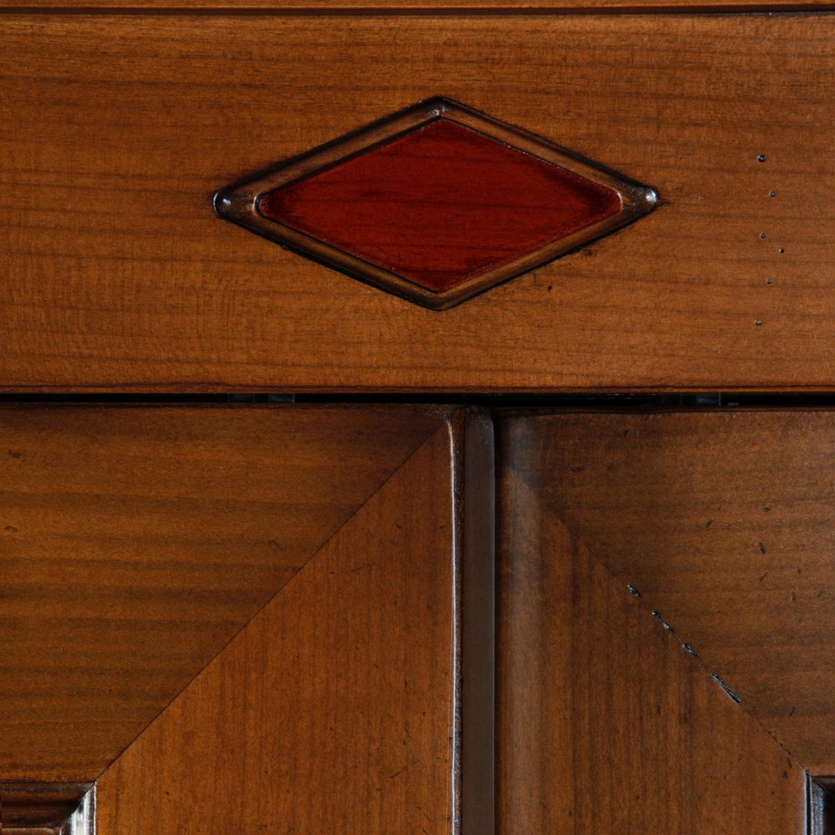 https://a.1stdibscdn.com/french-2-sliding-door-armoire-in-solid-cherry-classical-directoire-style-for-sale-picture-7/f_57342/f_311760521667731895015/MEL_4101MDRO_Armoire_2_portes_coulissantes_merisier_D_cannelures_rouges_d_tail_losange_1__master.jpeg