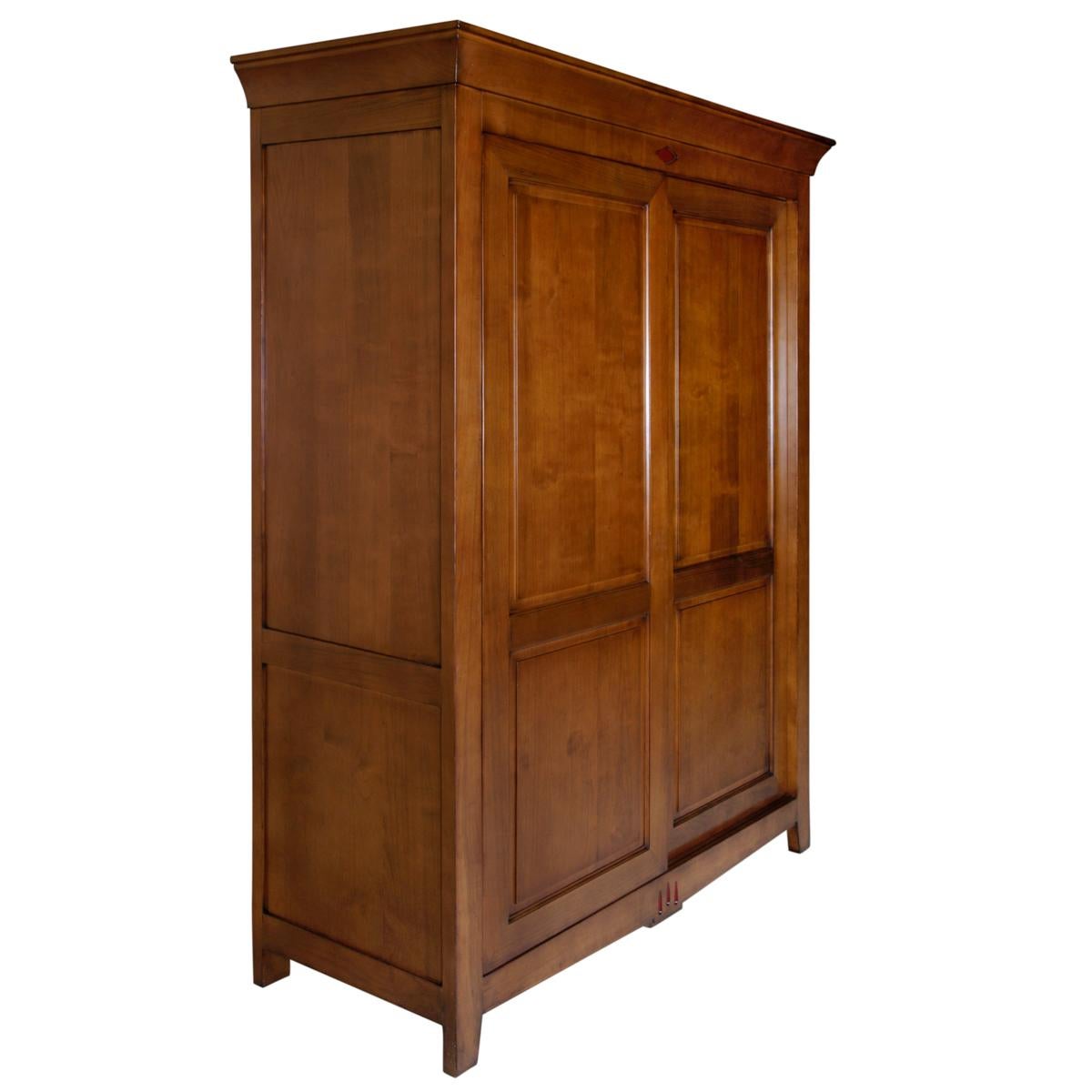 https://a.1stdibscdn.com/french-2-sliding-door-armoire-in-solid-cherry-classical-directoire-style-for-sale-picture-12/f_57342/f_311760521667731896080/MEL_4101MDRO_Armoire_2_portes_coulissantes_merisier_D_cannelures_rouges_portes_ferm_es_biais_1__master.jpeg