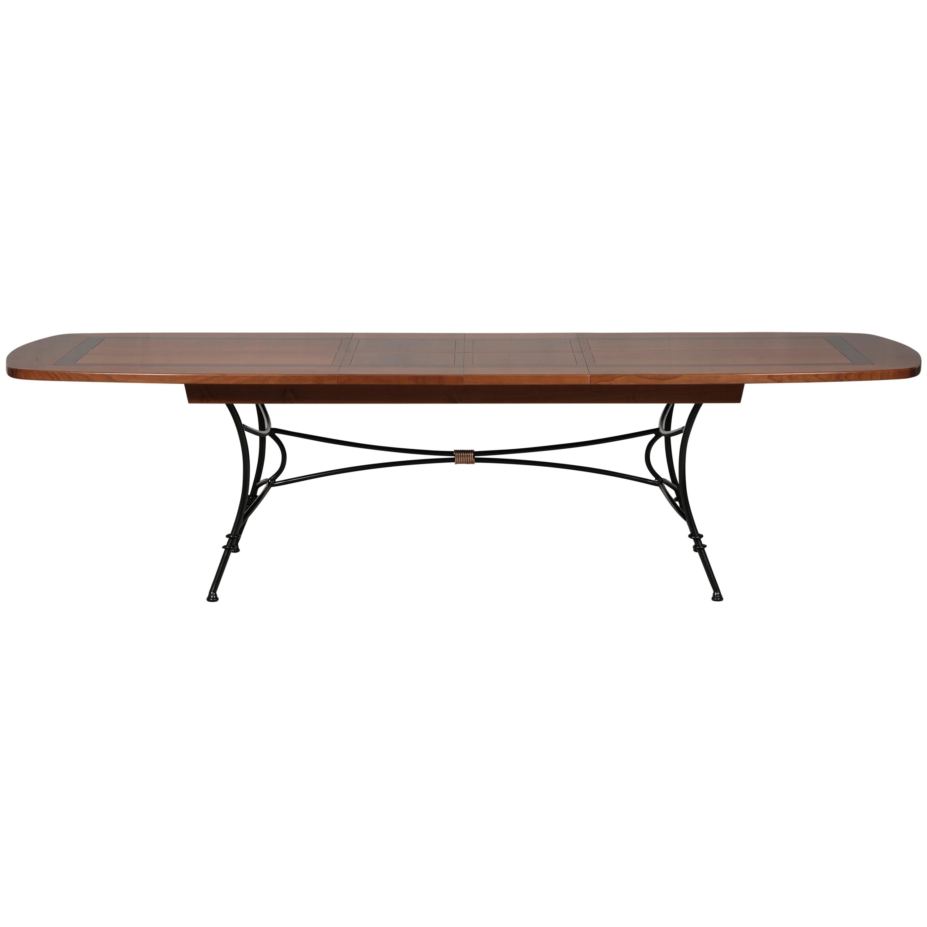 https://a.1stdibscdn.com/wrought-iron-table-with-solid-cherry-top-integrated-extensions-for-sale-picture-3/f_57342/f_404705721720088029920/MEL_5703MDN_Table_ovalis_e_merisier_D_et_cadre_noir_profil_2_allonges_d_pli_es_3000x3000_master.jpg