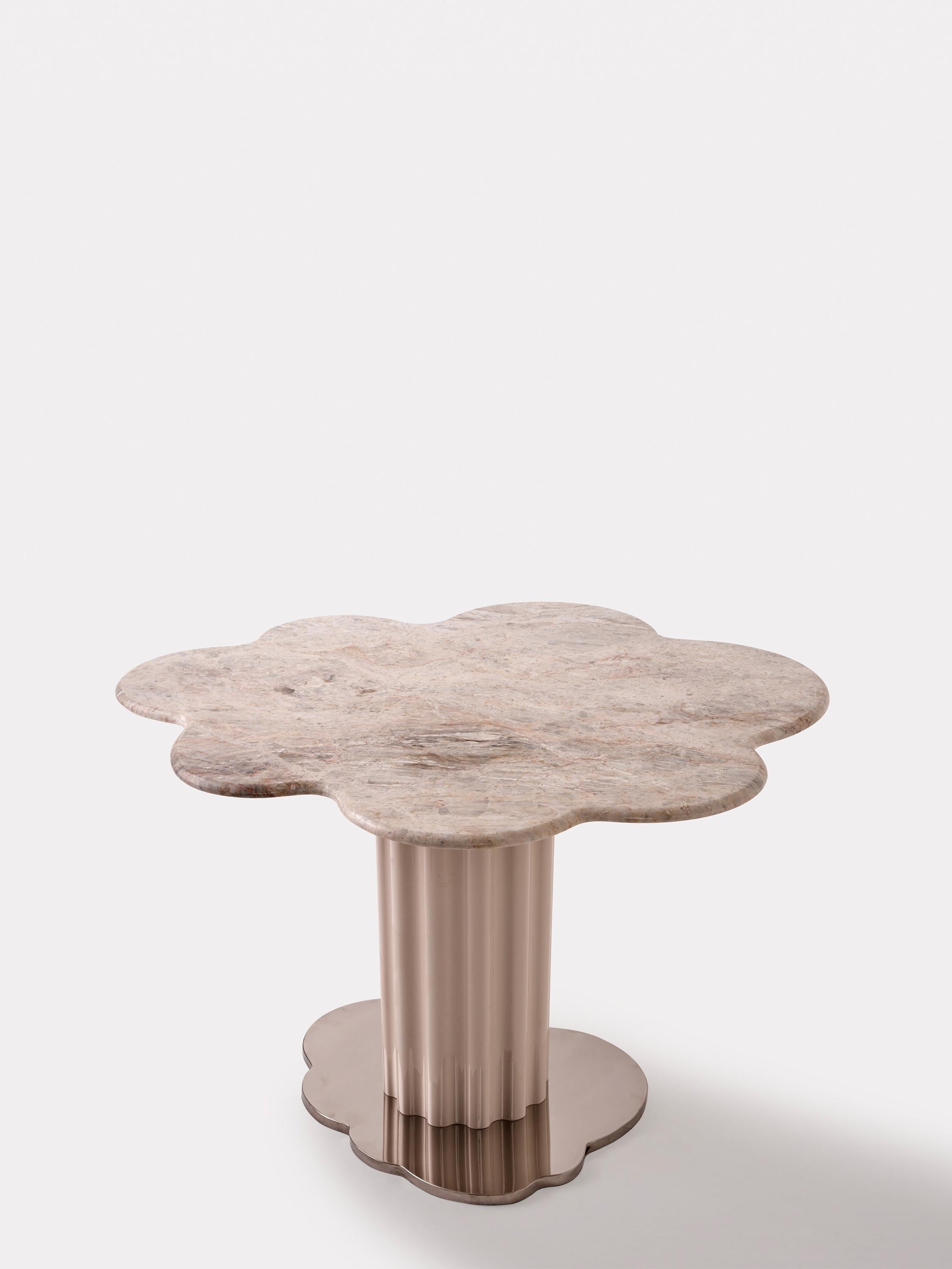 https://a.1stdibscdn.com/sulpap-cream-colored-marble-dining-table-with-polished-chrome-base-for-sale-picture-4/f_36601/f_282652721650175074592/MERVE_KAHRAMAN_SULPAPTABLE_05_master.jpg