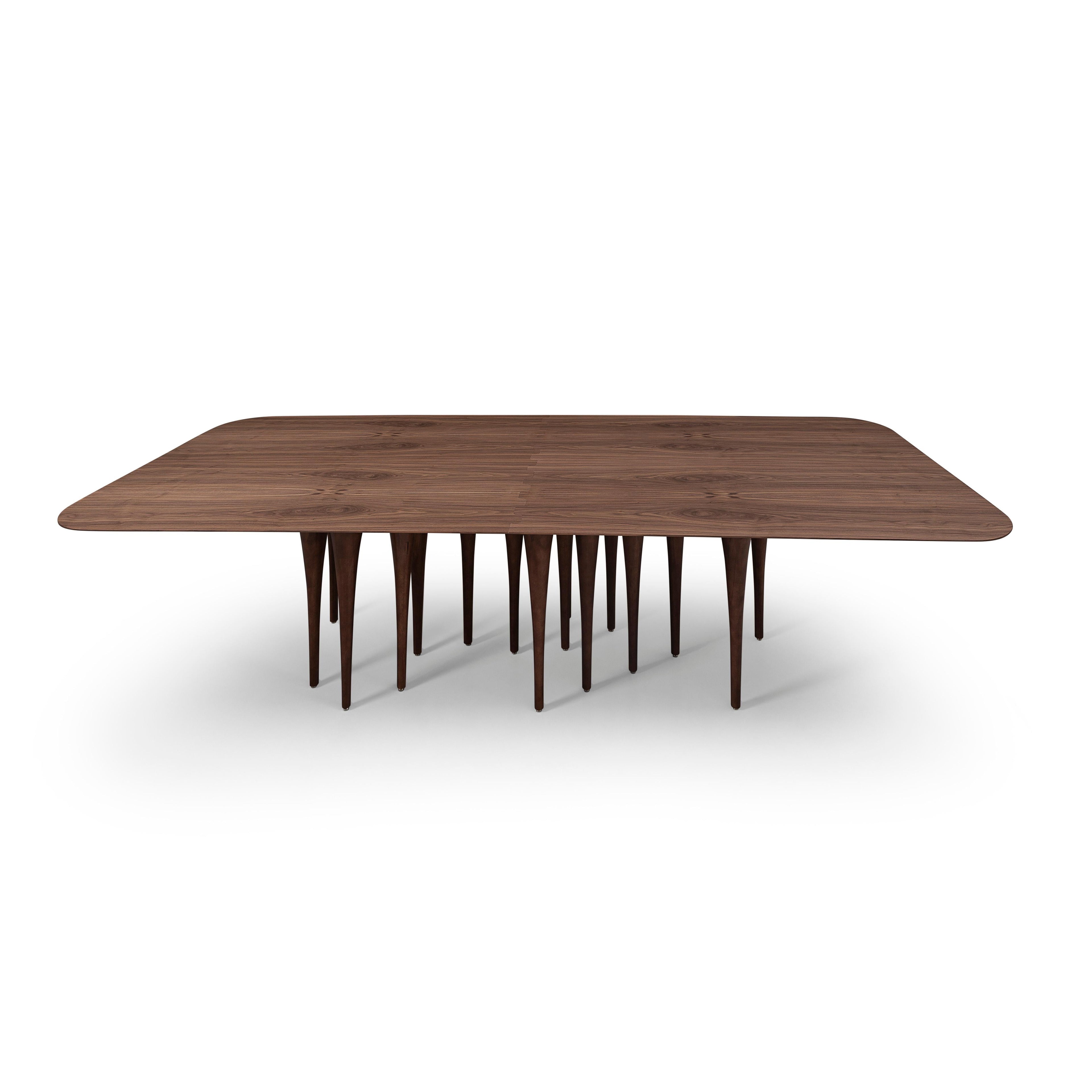 https://a.1stdibscdn.com/pin-dining-table-in-walnut-with-12-legs-version-98-for-sale-picture-3/f_52822/f_248815121628791222961/MH_9020_PIN_149_NOGUEIRA_02_master.jpg