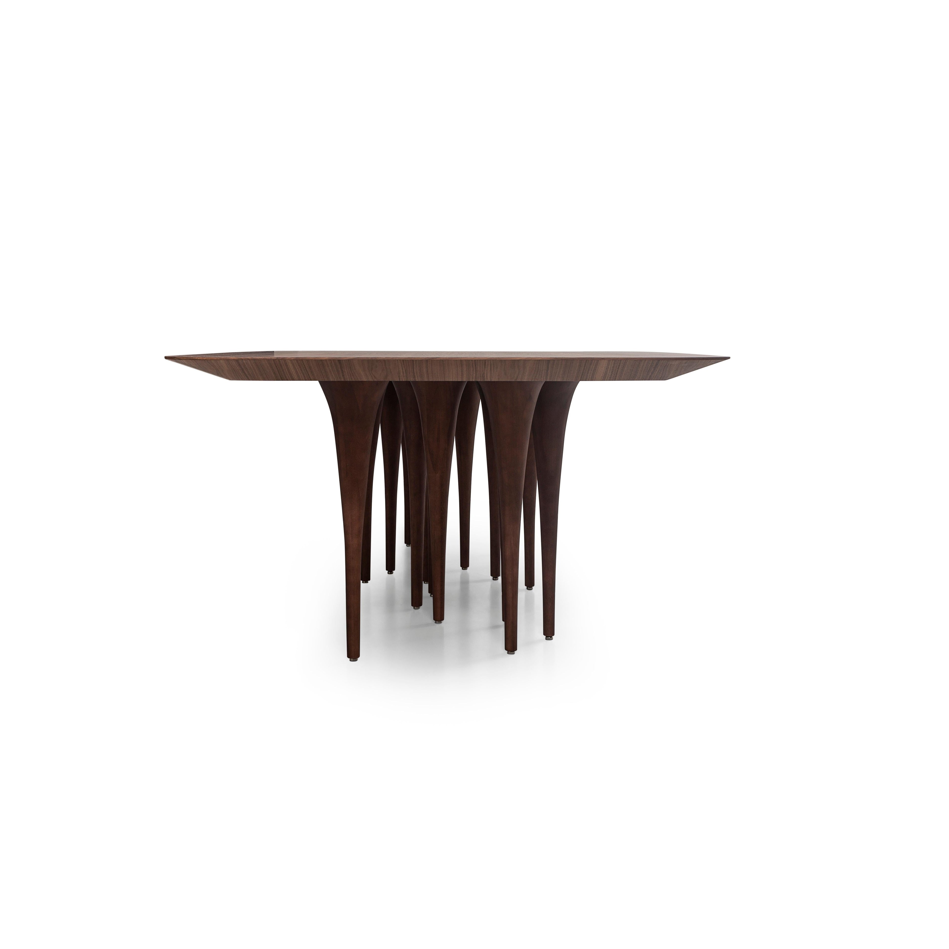 https://a.1stdibscdn.com/pin-dining-table-in-walnut-with-12-legs-version-98-for-sale-picture-4/f_52822/f_248815121628791223367/MH_9020_PIN_149_NOGUEIRA_04_master.jpg