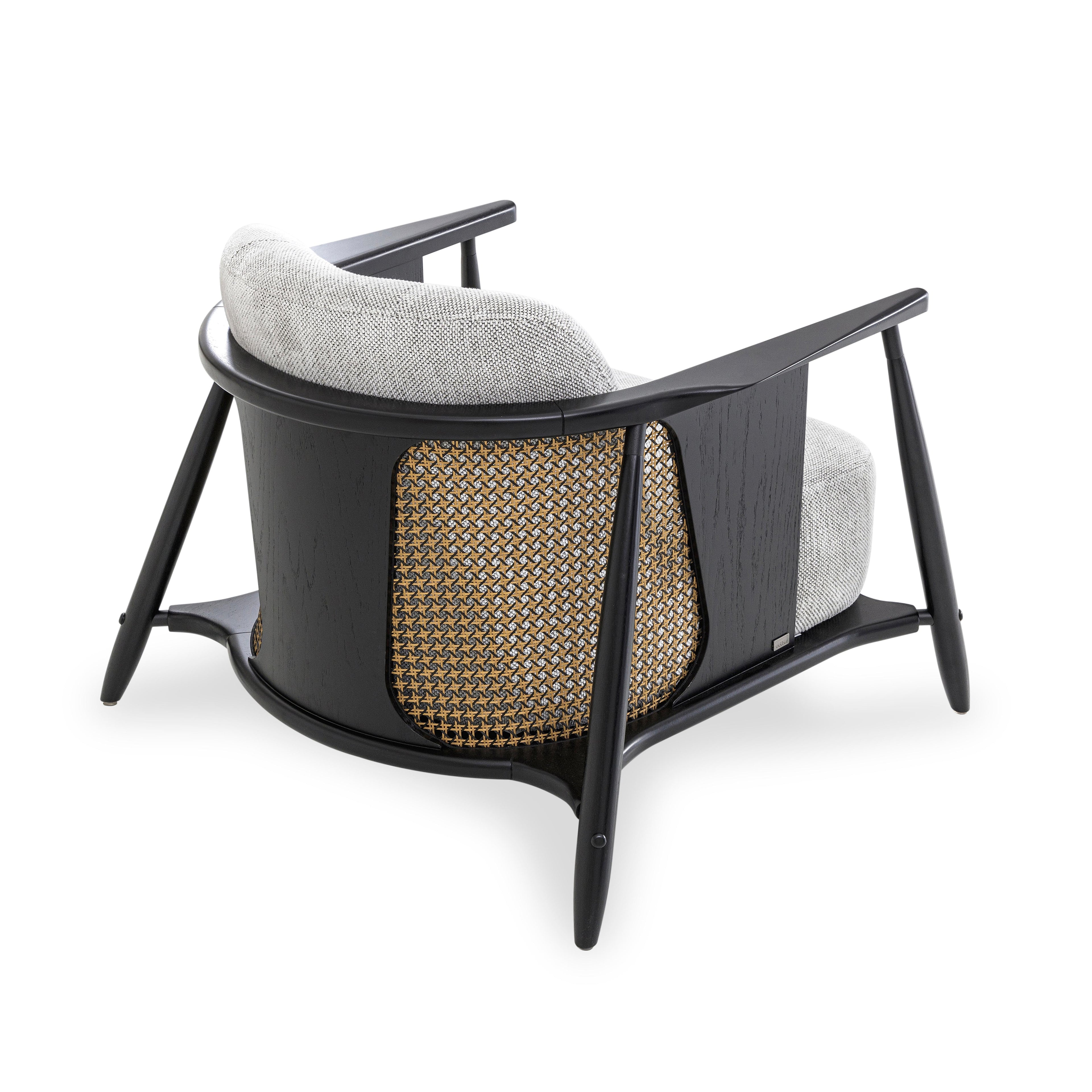 https://a.1stdibscdn.com/laguna-occasional-chair-in-grating-upholstered-and-black-wood-frame-for-sale-picture-6/f_52822/f_301891121661804057409/MH_9832_POLTRONA_LAGUNA_MESCLADO_077TC119_06_master.jpg