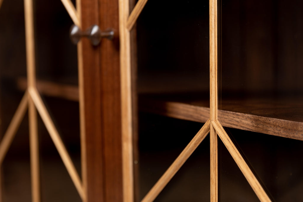 https://a.1stdibscdn.com/contemporary-walnut-cabinet-with-glass-doors-and-butternut-details-for-sale-picture-4/f_38643/1571942203531/MMH20191001_04_master.jpg