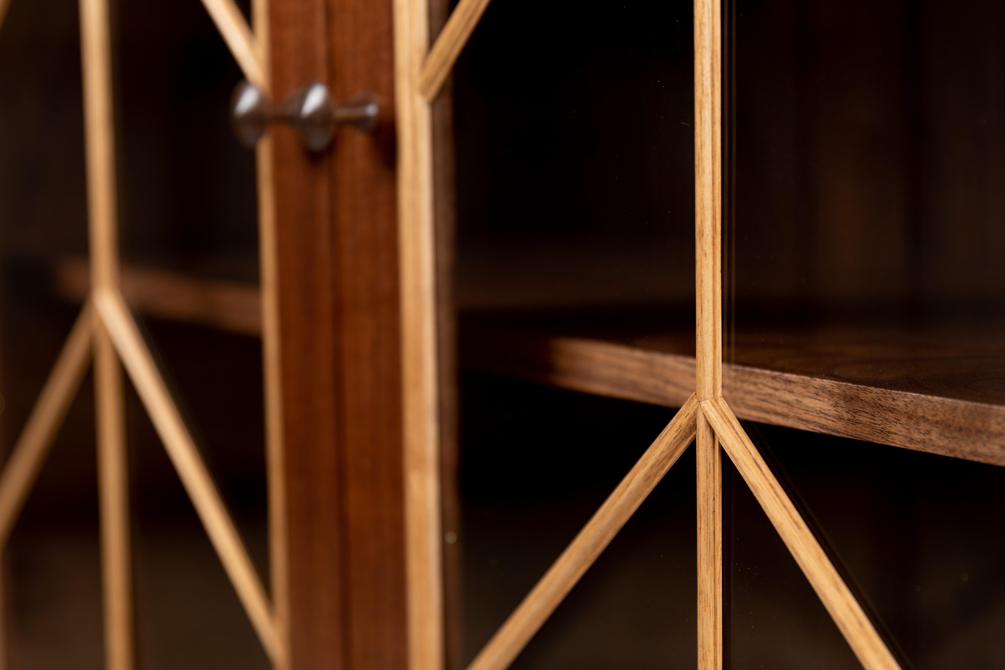 https://a.1stdibscdn.com/contemporary-walnut-cabinet-with-glass-doors-and-butternut-details-for-sale-picture-4/f_38643/1571942203531/MMH20191001_04_master.jpg