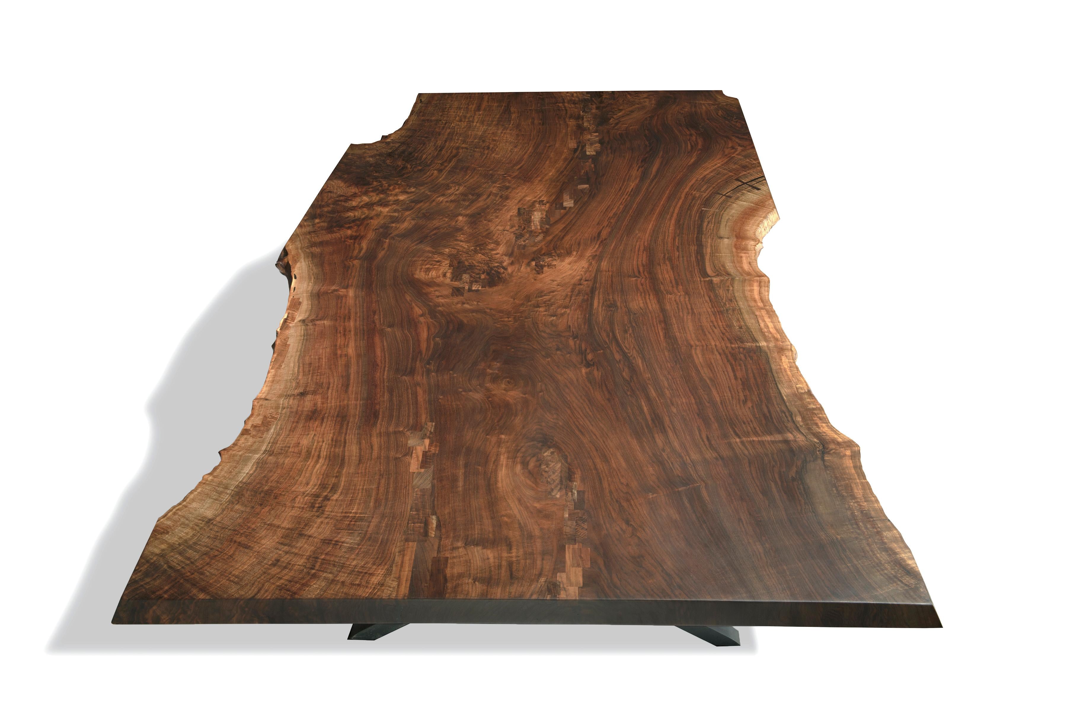 https://a.1stdibscdn.com/claro-walnut-single-slab-live-edge-dining-table-in-stock-for-sale-picture-2/f_51472/f_173839521577725197661/MOB042_copy_edited_1_master.jpg