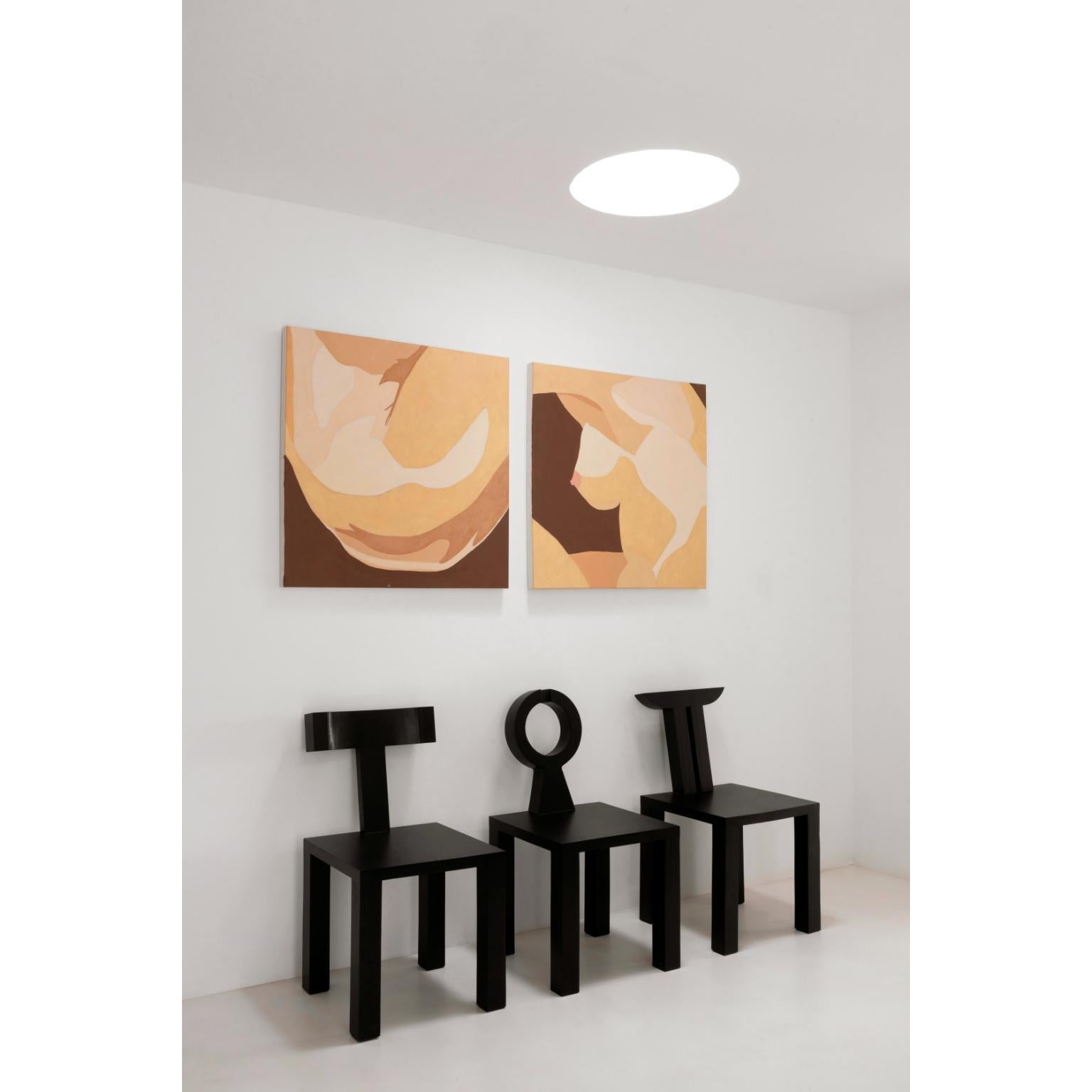 https://a.1stdibscdn.com/ebonized-wood-monograma-ii-chair-by-studio-orth-for-sale-picture-4/f_12192/f_480307021765980225691/MONOGRAMA_I_CHAIR_3_master.jpg
