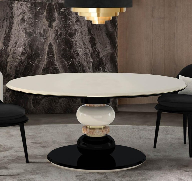 https://a.1stdibscdn.com/contemporary-dining-table-in-cream-and-black-lacquer-for-sale-picture-4/f_27693/f_294130321656910426927/MRTHMT1_MAIN_master.jpg?width=768