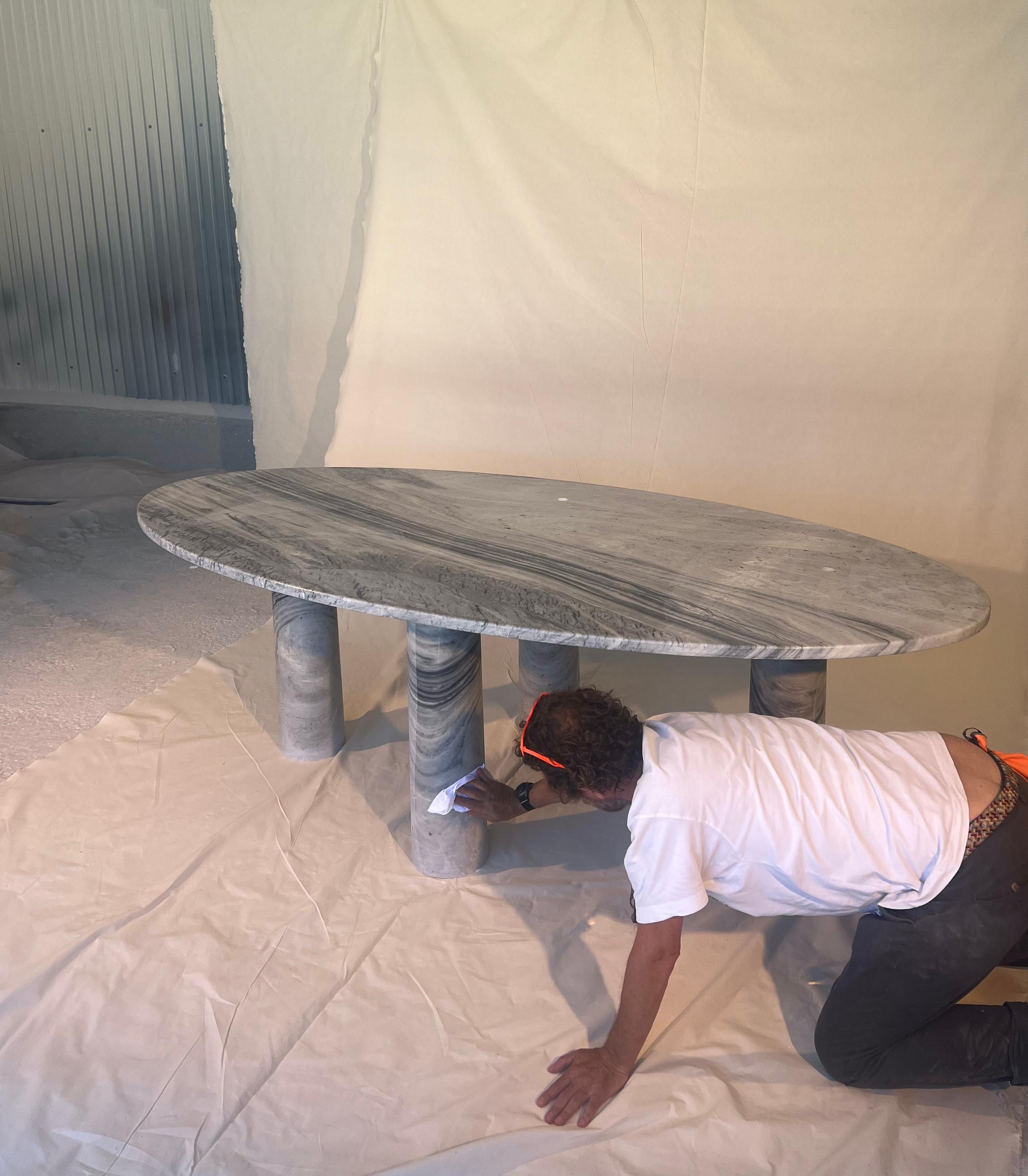 https://a.1stdibscdn.com/large-oval-marble-dining-table-with-column-legs-in-the-style-of-mario-bellini-for-sale-picture-6/f_80522/f_409995421723147307851/MY_HABITAT_Serpa_Stone_Polished_Look_master.jpg