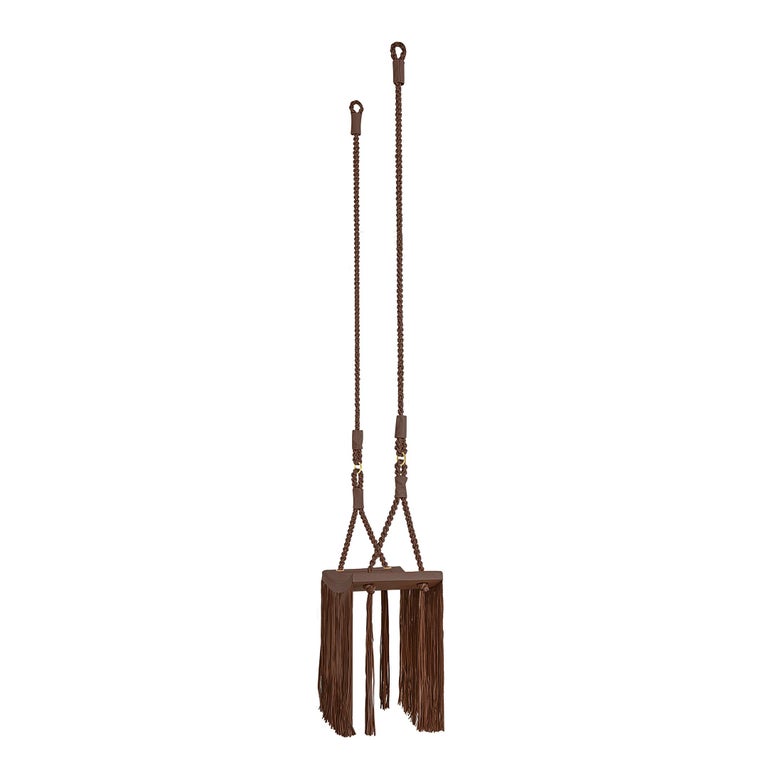 https://a.1stdibscdn.com/revoar-hanging-swing-chair-in-natural-leather-handmade-in-caramel-for-sale-picture-12/f_56842/f_234752921693833319164/Madras_Caramelo_Balan_o_Revoar_Studio_Marta_Manente_2_master.jpg?width=768