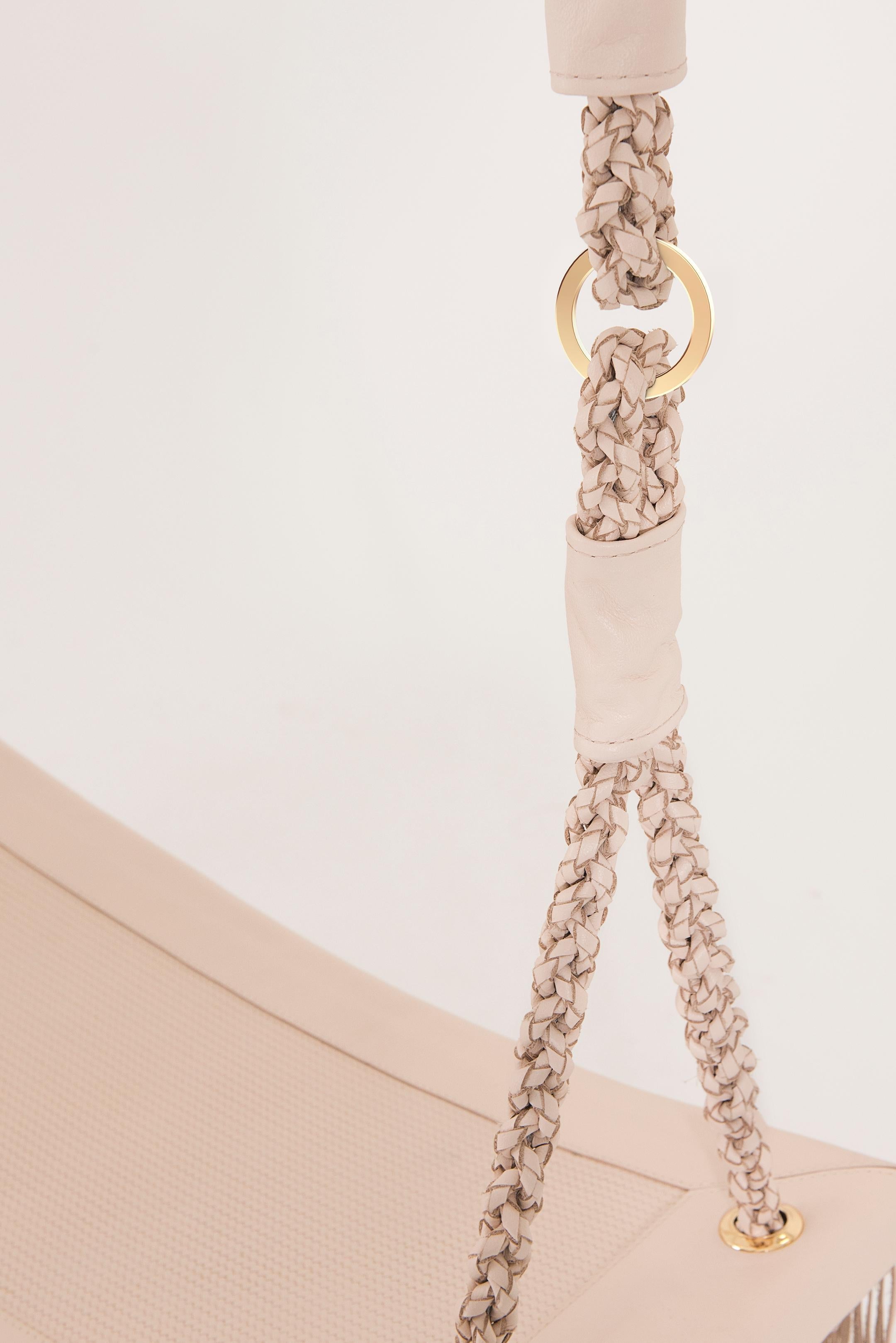 https://a.1stdibscdn.com/revoar-hanging-swing-chair-in-natural-leather-handmade-light-pink-color-for-sale-picture-5/f_56842/f_234750821693834271697/Madras_Rosa_Claro_Balan_o_Revoar_Studio_Marta_Manente_5_master.jpg