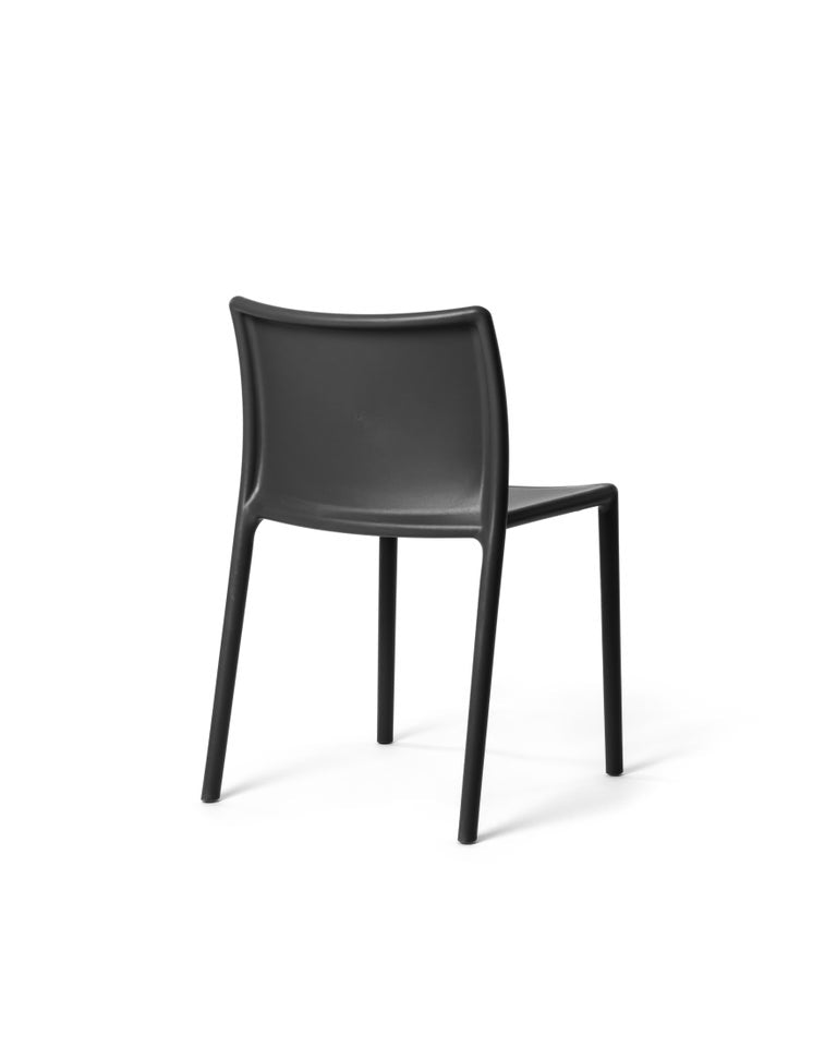 https://a.1stdibscdn.com/set-of-4-air-chair-in-black-by-jasper-morrison-for-magis-for-sale-picture-4/f_16392/f_361871721694866561640/Magis_air_chair_product_back_lateral_SD74_anthracite_01_hr_master.jpg?width=768