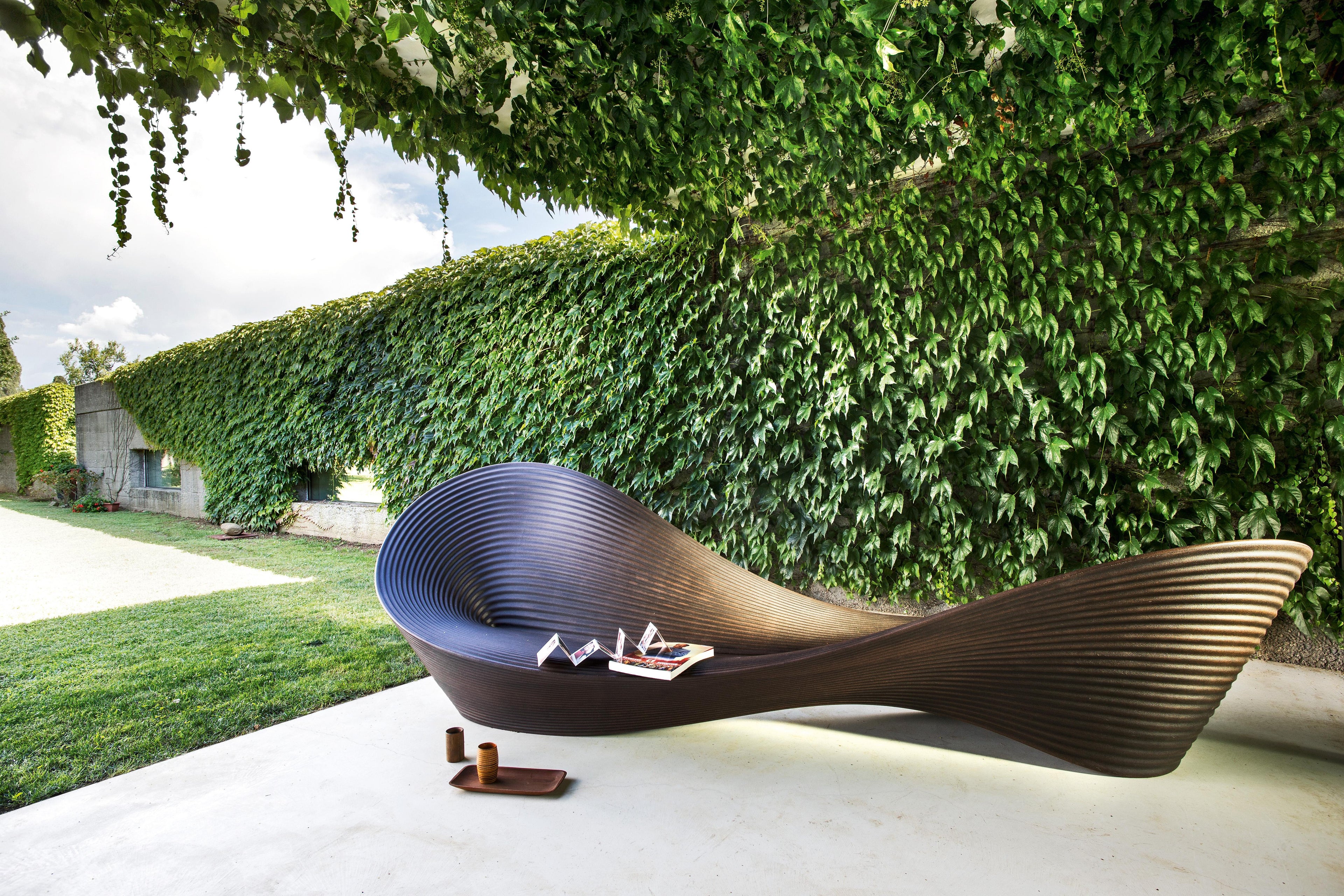 https://a.1stdibscdn.com/magis-folly-bench-sofa-ron-arad-rotational-moulded-polyethylene-outdoor-for-sale-picture-9/f_105752/f_474300421762542440233/Magis_folly_ambient_mono_SD18_outdoor_01_hr_master.jpg
