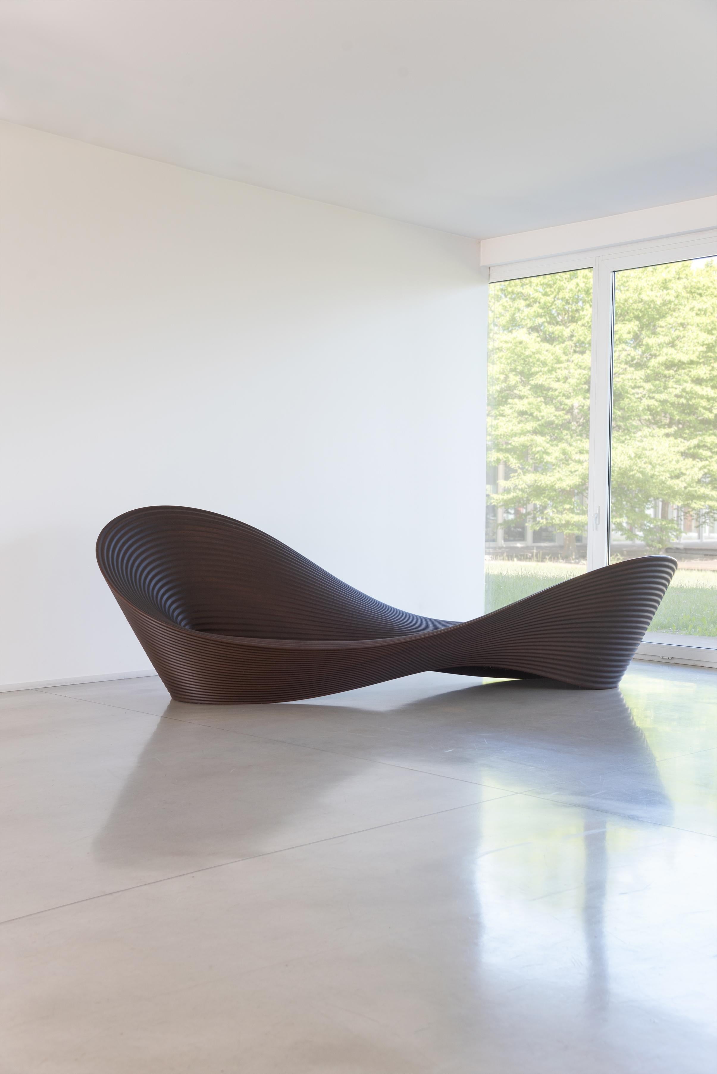 https://a.1stdibscdn.com/magis-folly-bench-sofa-ron-arad-rotational-moulded-polyethylene-outdoor-for-sale-picture-6/f_105752/f_474300421762542427380/Magis_folly_bench_ambient_SD18_brown_01_hr_master.jpg